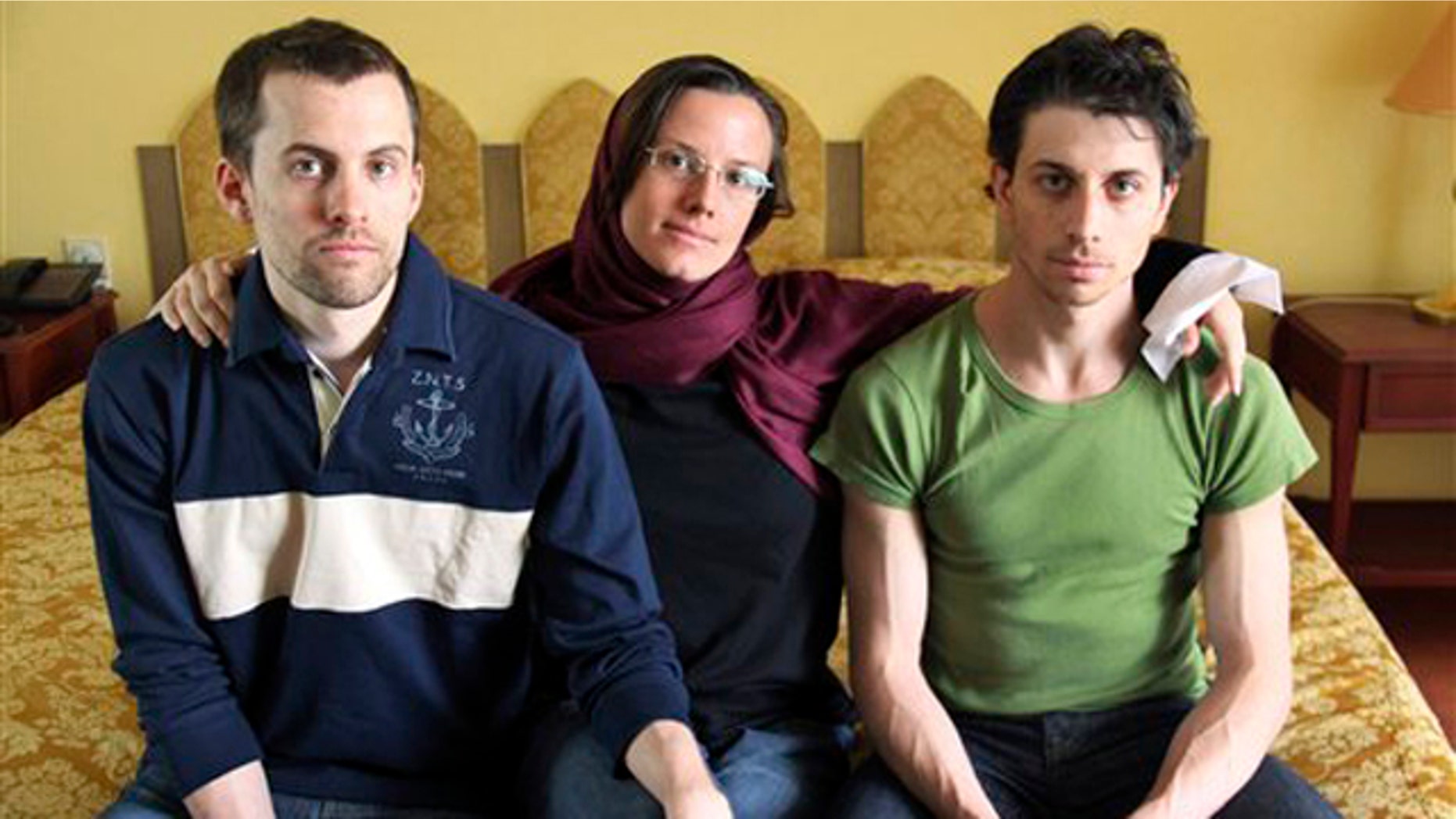 In this May 20, 2010 file photo, American hikers Shane Bauer, left, Sarah Shourd, center, and Josh Fattal, sit at the Esteghlal Hotel in Tehran, Iran.