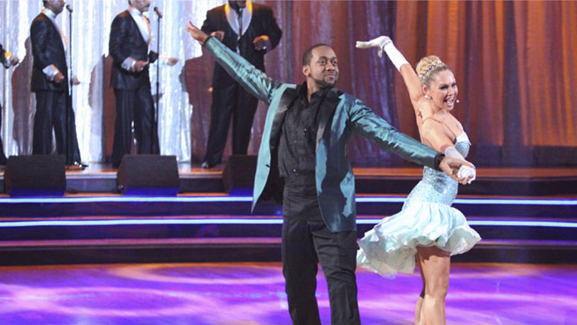 In this April 23, 2012 photo released by ABC, actor Jaleel White, left, and his partner Kym Johnson perform on the celebrity dance competition series, "Dancing with the Stars," in Los Angeles.