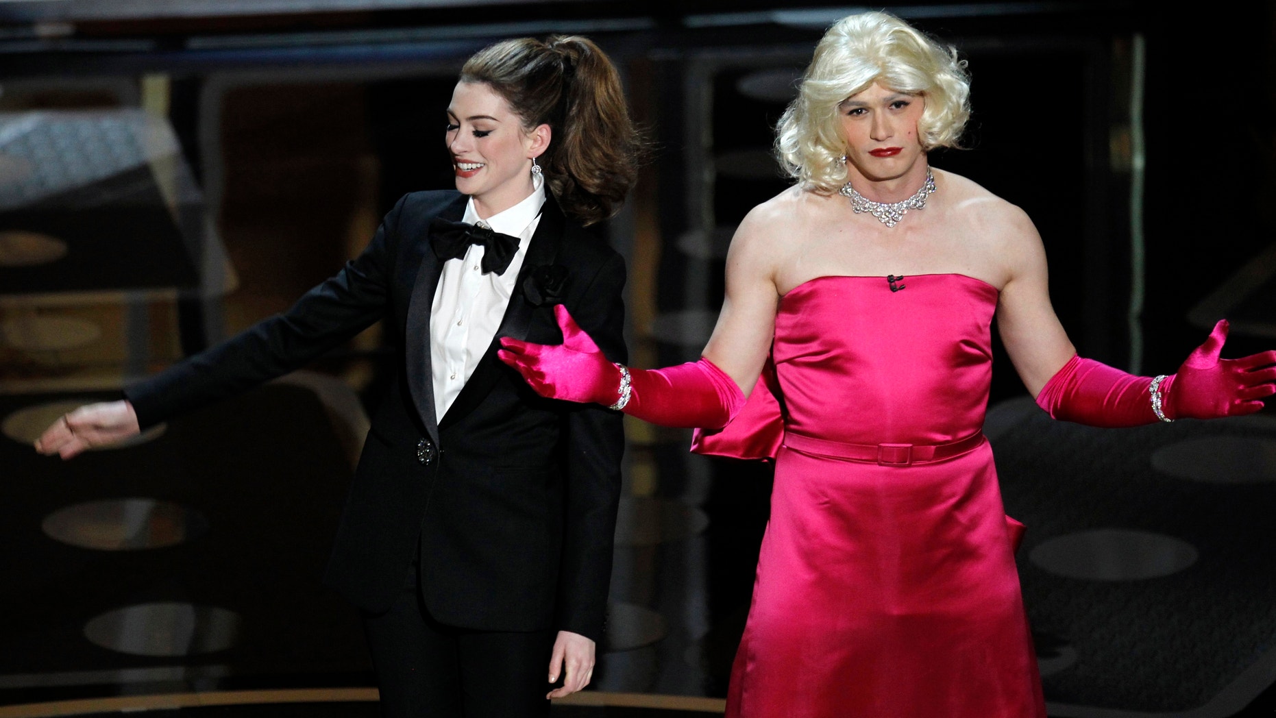 James Franco dresses up as Marilyn Monroe while hosting the 2011 Academy Awards with Anne Hathaway.