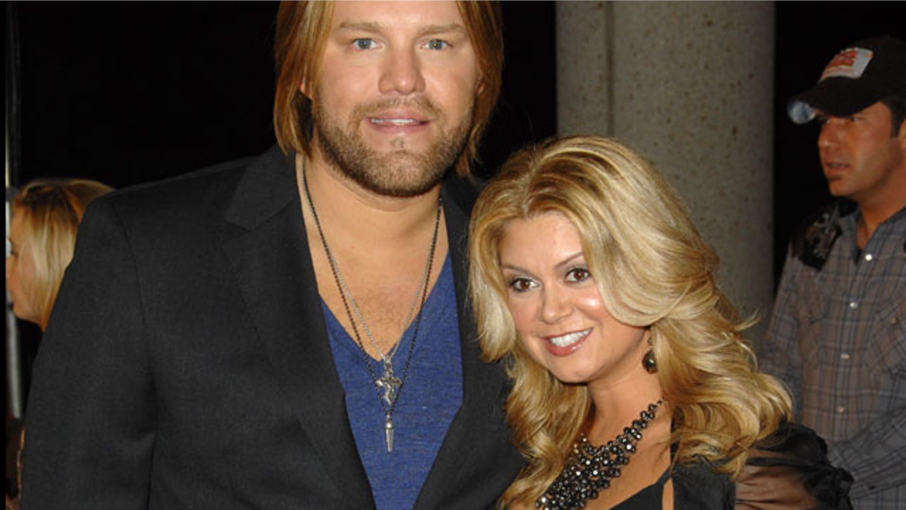 In this Nov. 10, 2009 file photo, recording artist James Otto and his wife Amy attend the 57th Annual BMI Country Awards in Nashville, Tenn.