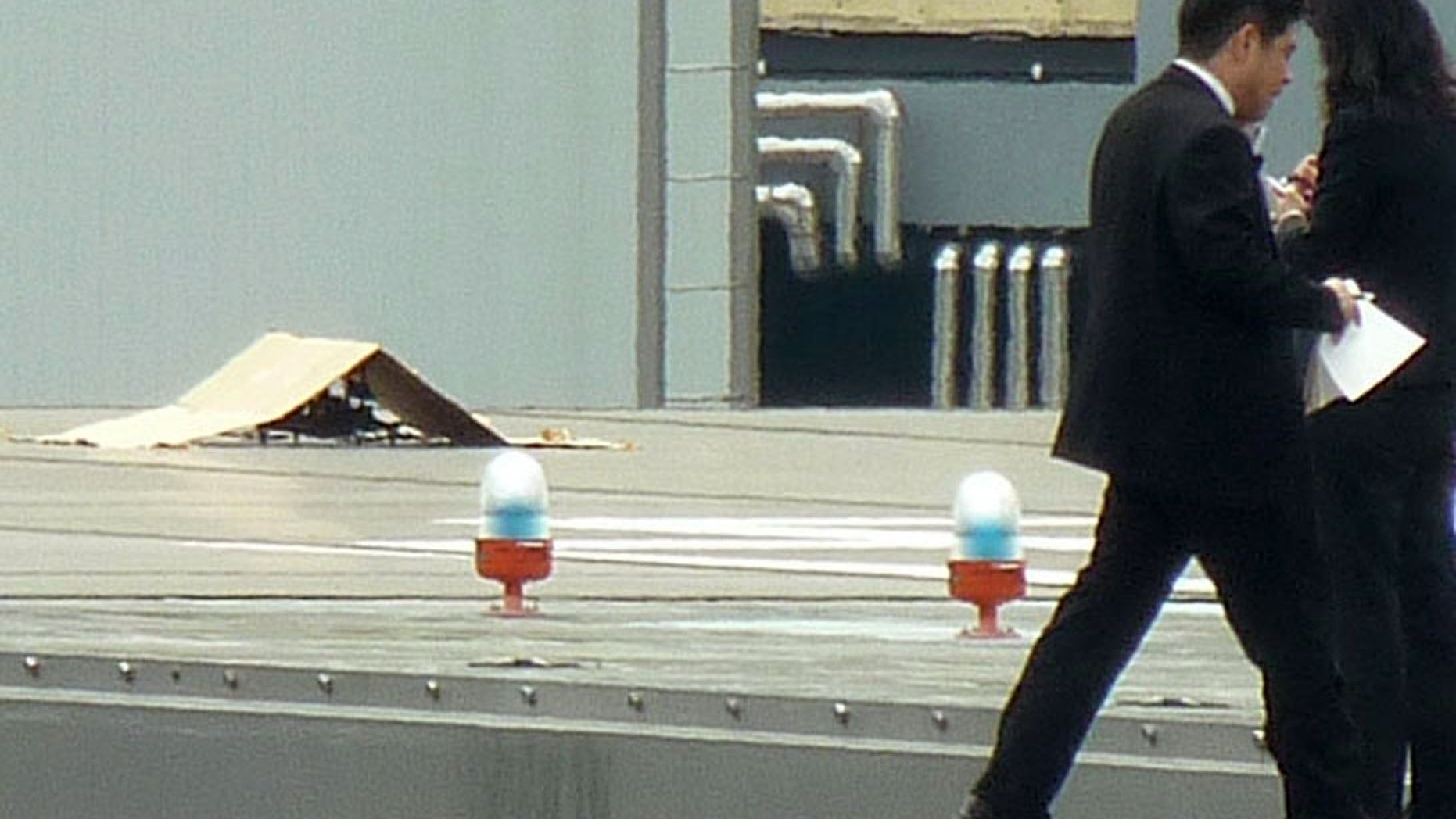 April 22, 2015 - A small drone covered with cardboard on the roof of Prime Minister Shizo Abe's official residence in Tokyo. Japanese police said Friday they are investigating a man who claimed responsibility for landing the drone. Police said the man turned himself in.