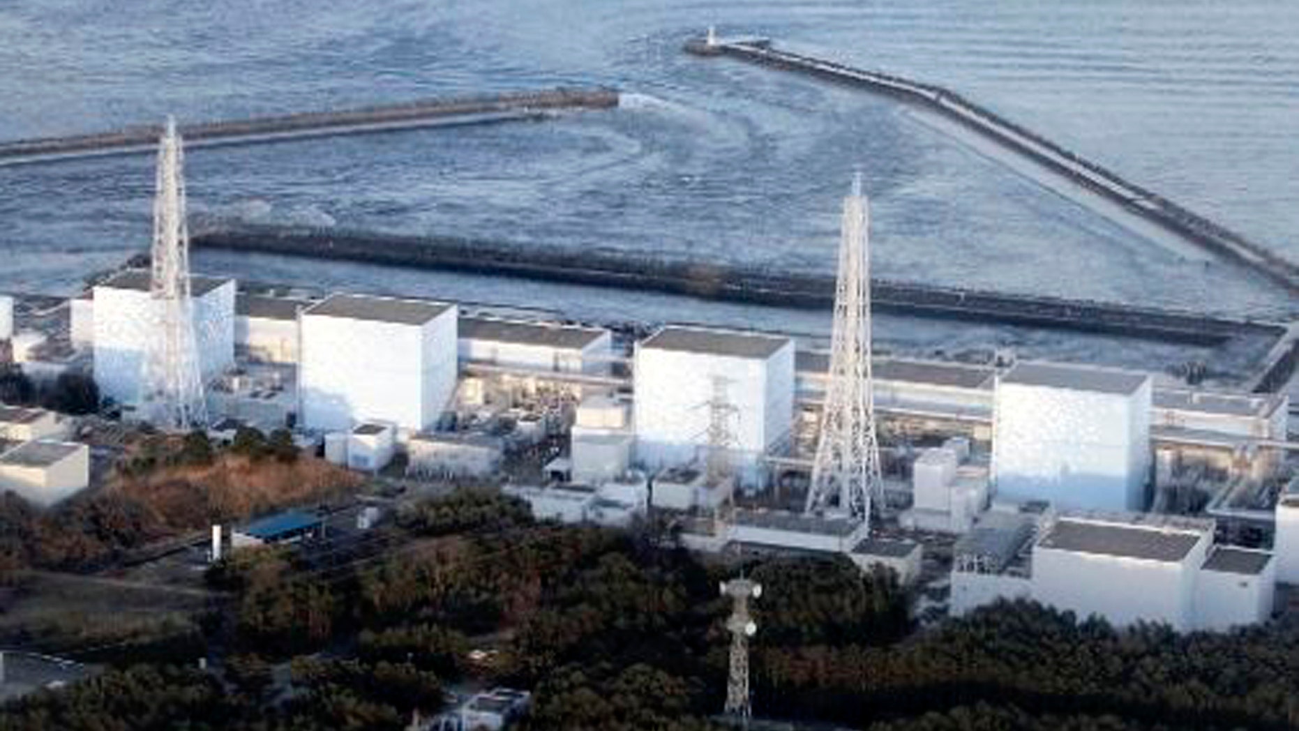 March 11: Fukushima Daiichi power plant's Unit 1 is seen in Okumamachi, Fukushima prefecture, Japan. The nuclear power plant affected by a massive earthquake is facing a possible meltdown, an official with Japan's nuclear safety commission said Saturday. (AP/The Yomiuri Shimbun)