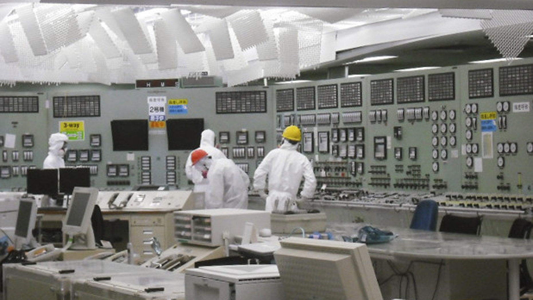 March 26: In this photo released by Tokyo Electric Power Co. via Kyodo News, lighting becomes available in the control room of Unit 2 reactor at the stricken Fukushima Dai-ichi nuclear power plant in Okumamachi, Fukushima prefecture, Japan. (AP/TEPCO)