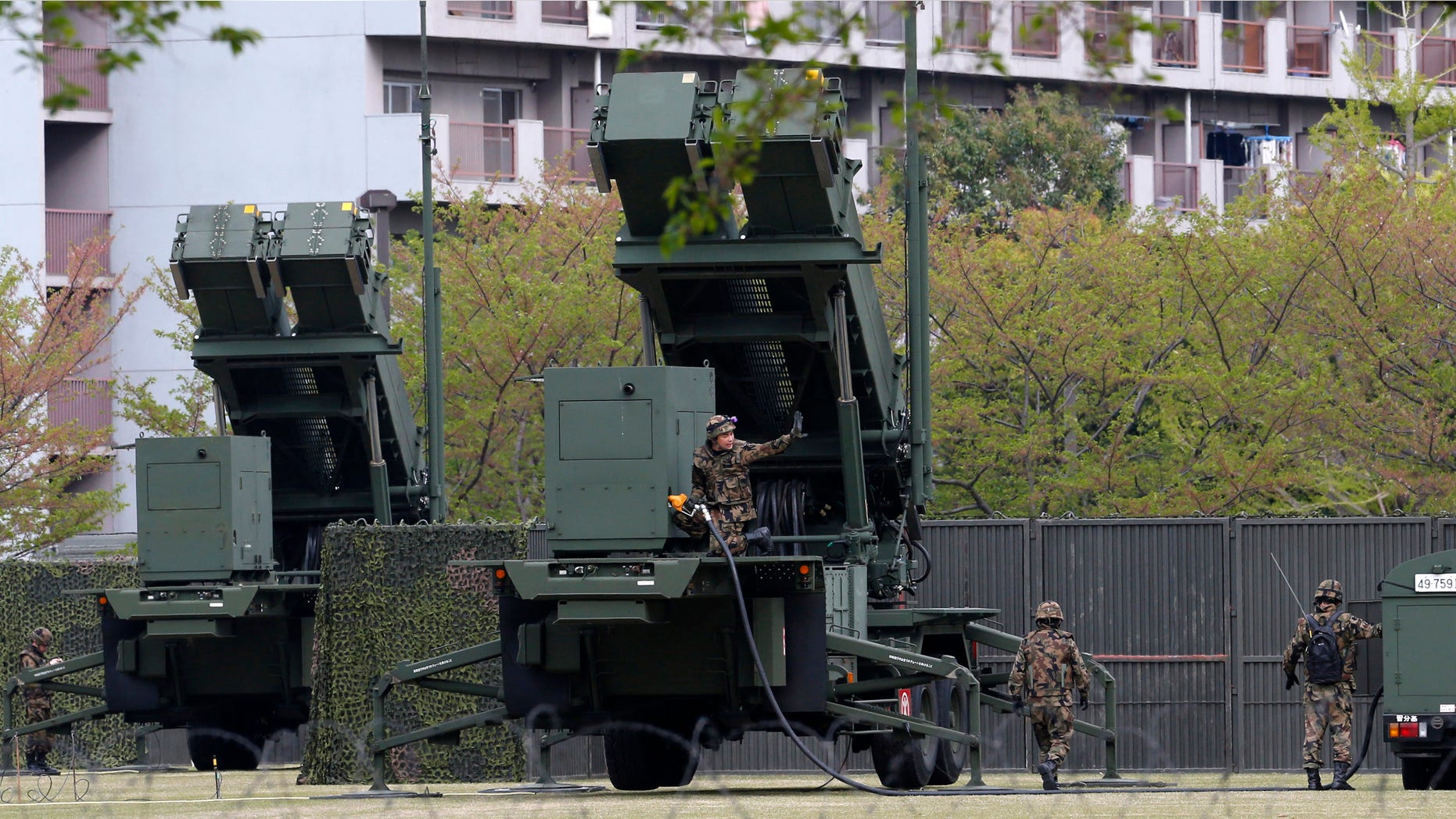 April 12, 2013: Japanese Self Defense Forces personnel refuel a PAC-3 missile interceptor, deployed at the compound of Japan's Defense Ministry amid a tense situation over a possible missile launch by North Korea in Tokyo.