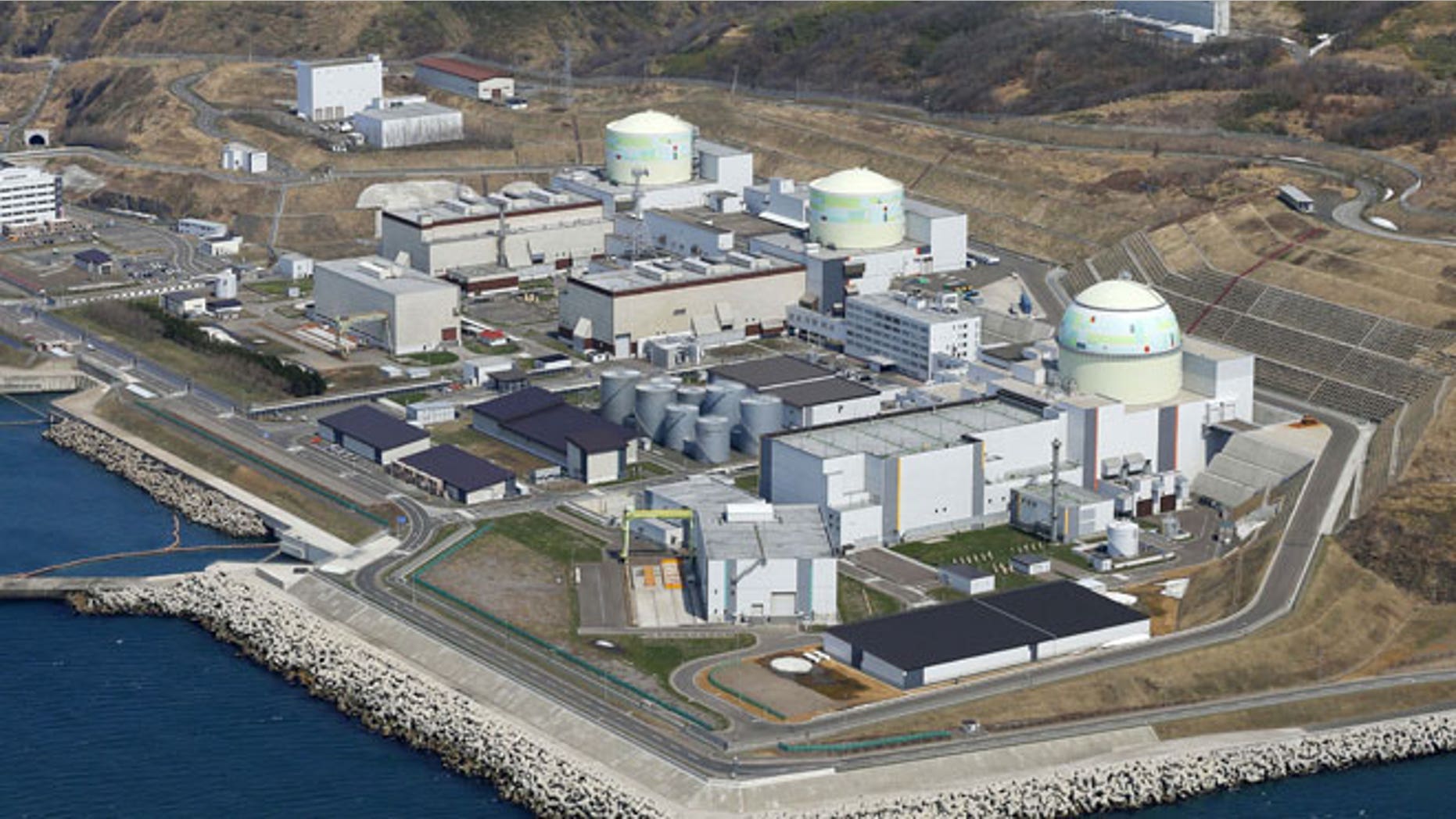 In this aerial photo taken April 22, 2012, three reactors, from left, No. 1, No. 2 and No. 3, are seen at the Tomari Nuclear Power Plant, operated by Hokkaido Electric Power Co., in Tomari in Japan's northernmost main island of Hokkaido.