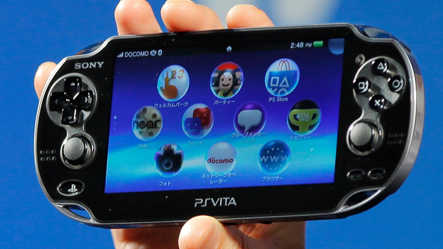 In this Sept. 14, 2011 file photo, Sony Computer Entertainment's PlayStation Vita is shown during a press conference in Tokyo.