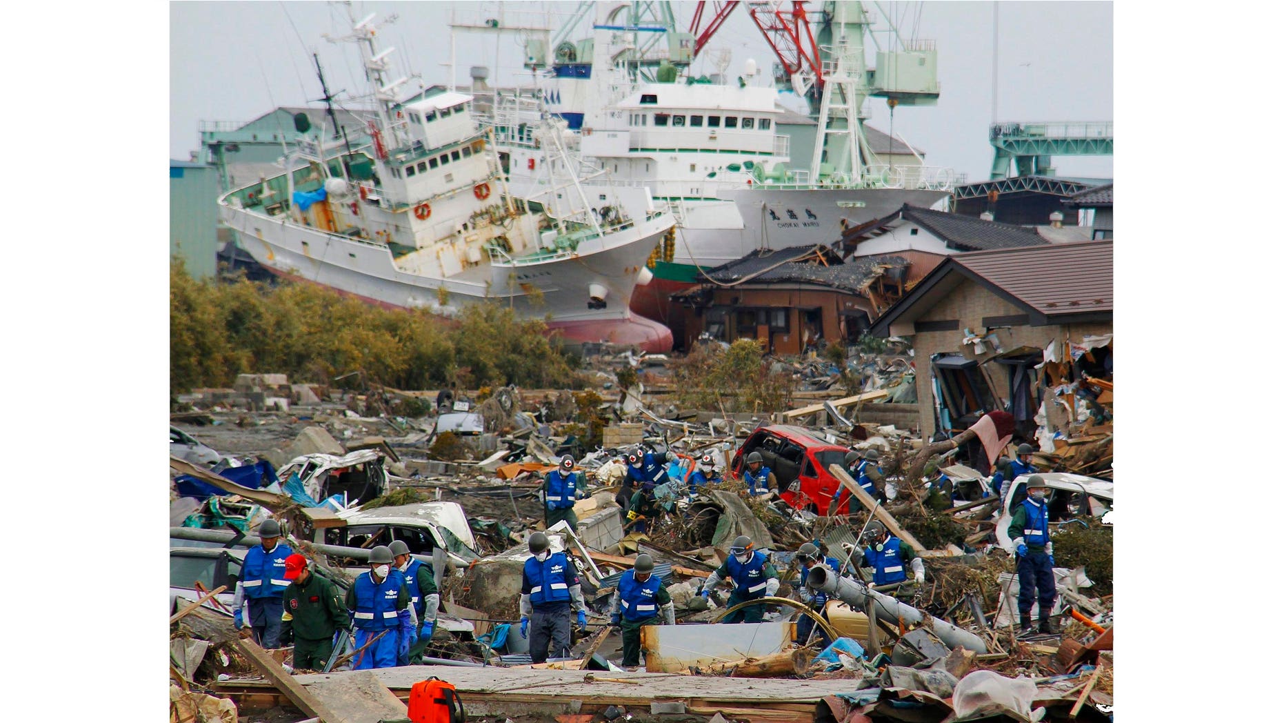 Soldiers of Japan Self-Defense Force and firefighters search for the victims in the rubbles Monday, March 14, 2011 in Matsushima, Miyagi Prefecture, Japan, three days after northeastern coastal towns were devastated by an earthquake and tsunami. (AP Photo/Kyodo News) JAPAN OUT, MANDATORY CREDIT, NO SALES IN CHINA, HONG KONG, JAPAN, SOUTH KOREA AND FRANCE