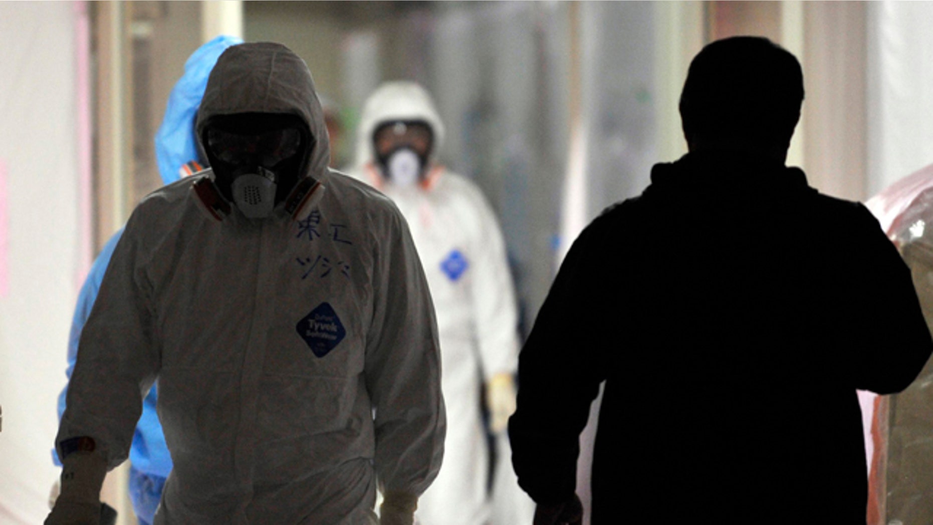Feb. 28: Workers at the emergency operation center of the stricken Fukushima Dai-ichi nuclear power plant of Tokyo Electric Power Co., in Okuma town, Fukushima prefecture, northeastern Japan.