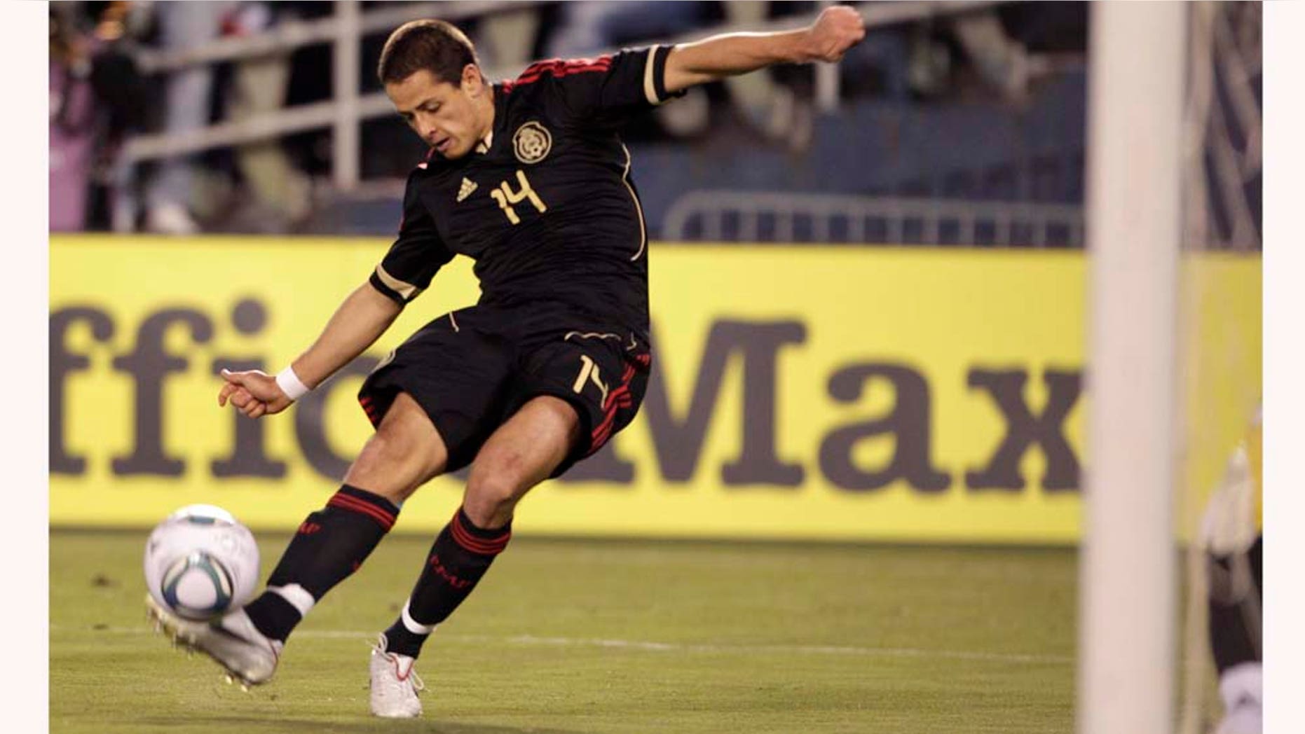 Mexico's Javier Hernandez misses a shot on goal at close range against Venezuela in the first half during an international friendly soccer match Tuesday, March 29, 2011, in San Diego. (AP Photo/Gregory Bull)