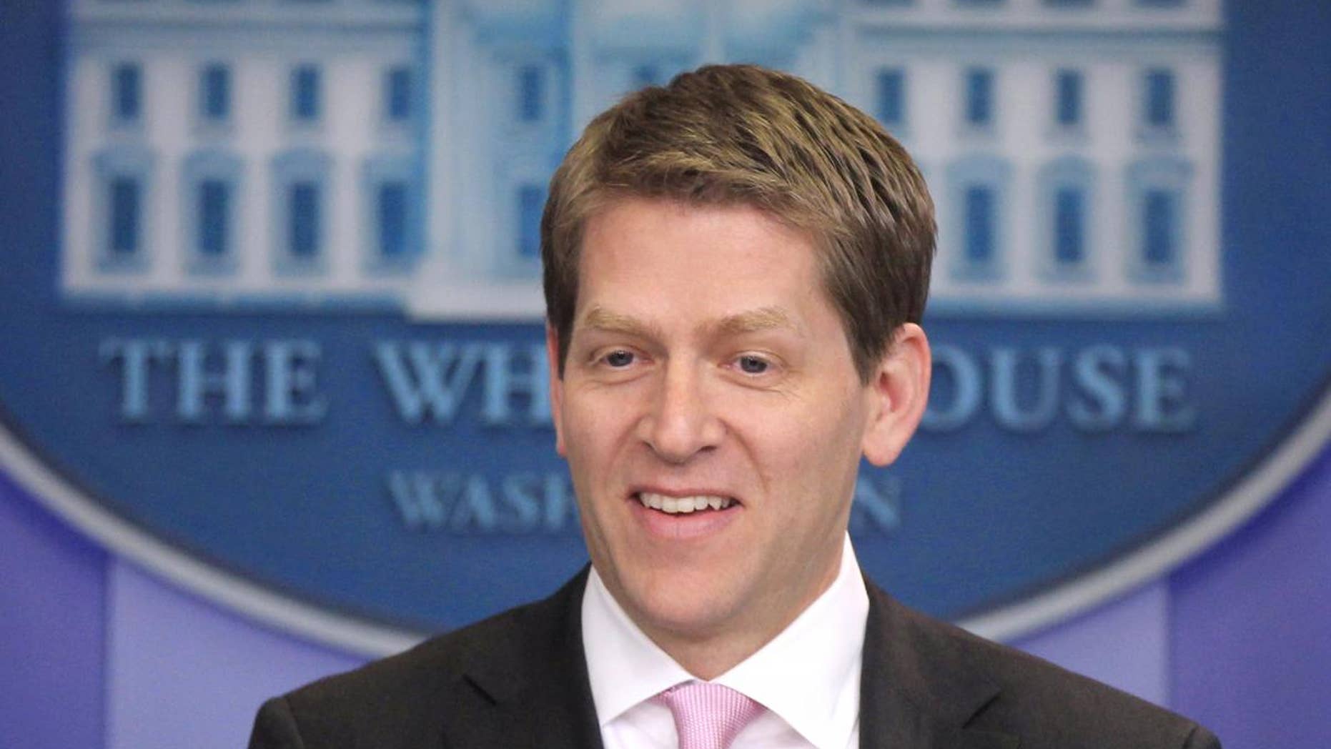 White House Press Secretary Jay Carney briefs reporters at the White House in Washington, Friday, April 1, 2011. (AP Photo/Charles Dharapak)