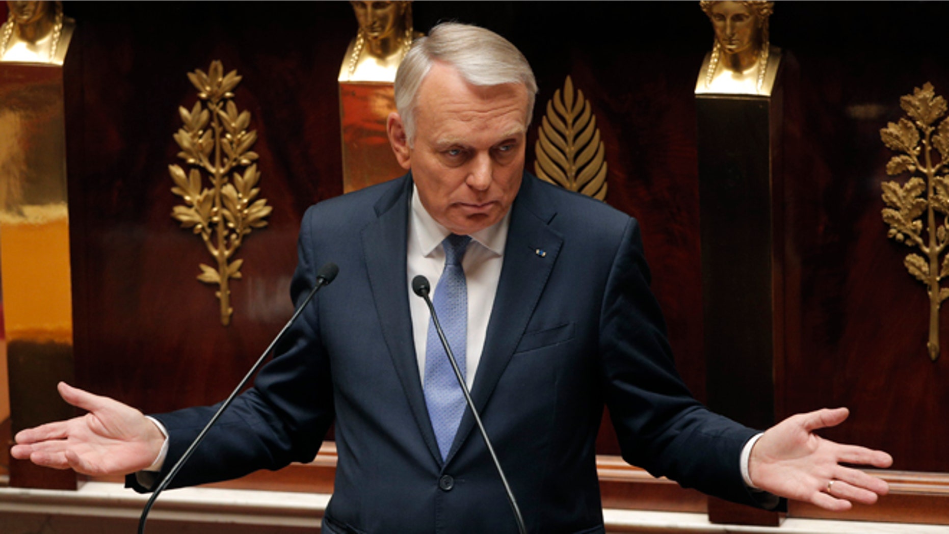 Sept. 4, 2013: France's Prime Minister Jean Marc Ayrault delivers a speech at the National Assembly in Paris. Ayrault addressed parliament during a debate to rally support for a military strike again Syria. The U.S. and France accuse Assad's Syrian government of using chemical weapons in an Aug. 21 attack on rebel-held suburbs of Damascus that killed hundreds.