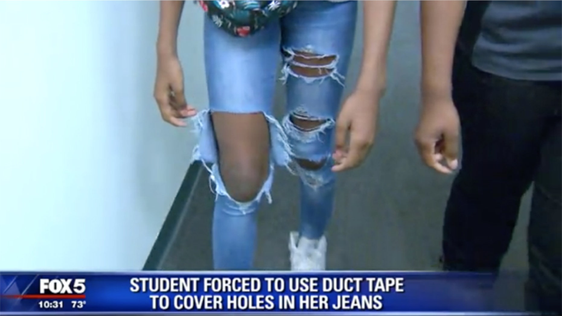 A teacher gave a seventh grade duct tape to cover the holes in her jeans, which violated the school's dress code.