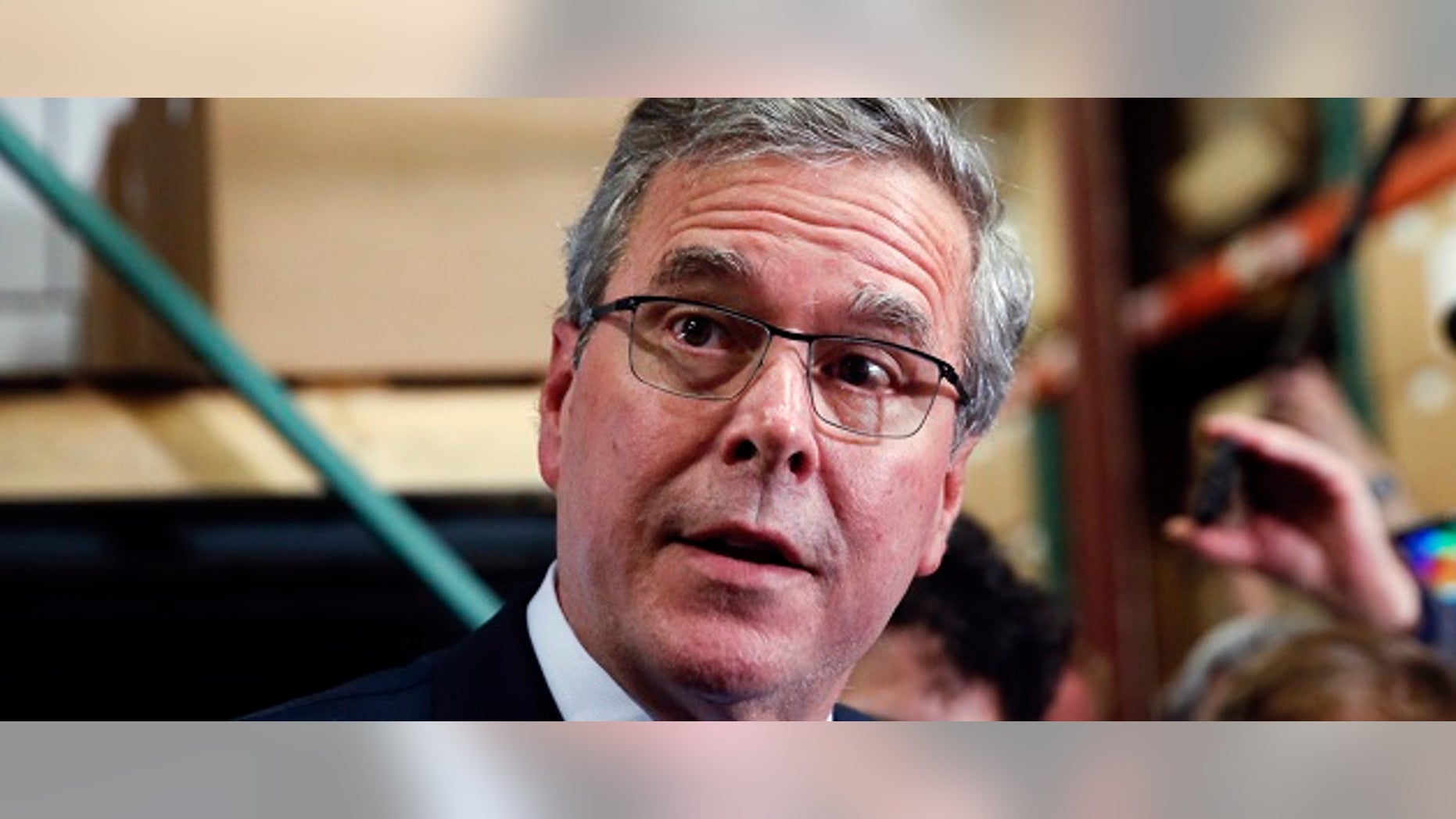 Former Florida Governor Jeb Bush talks to the media after visiting Integra Biosciences during a campaign stop in Hudson, New Hampshire March 13, 2015. REUTERS/Shannon Stapleton (UNITED STATES - Tags: HEALTH SCIENCE TECHNOLOGY POLITICS ELECTIONS HEADSHOT) - RTR4TAKO