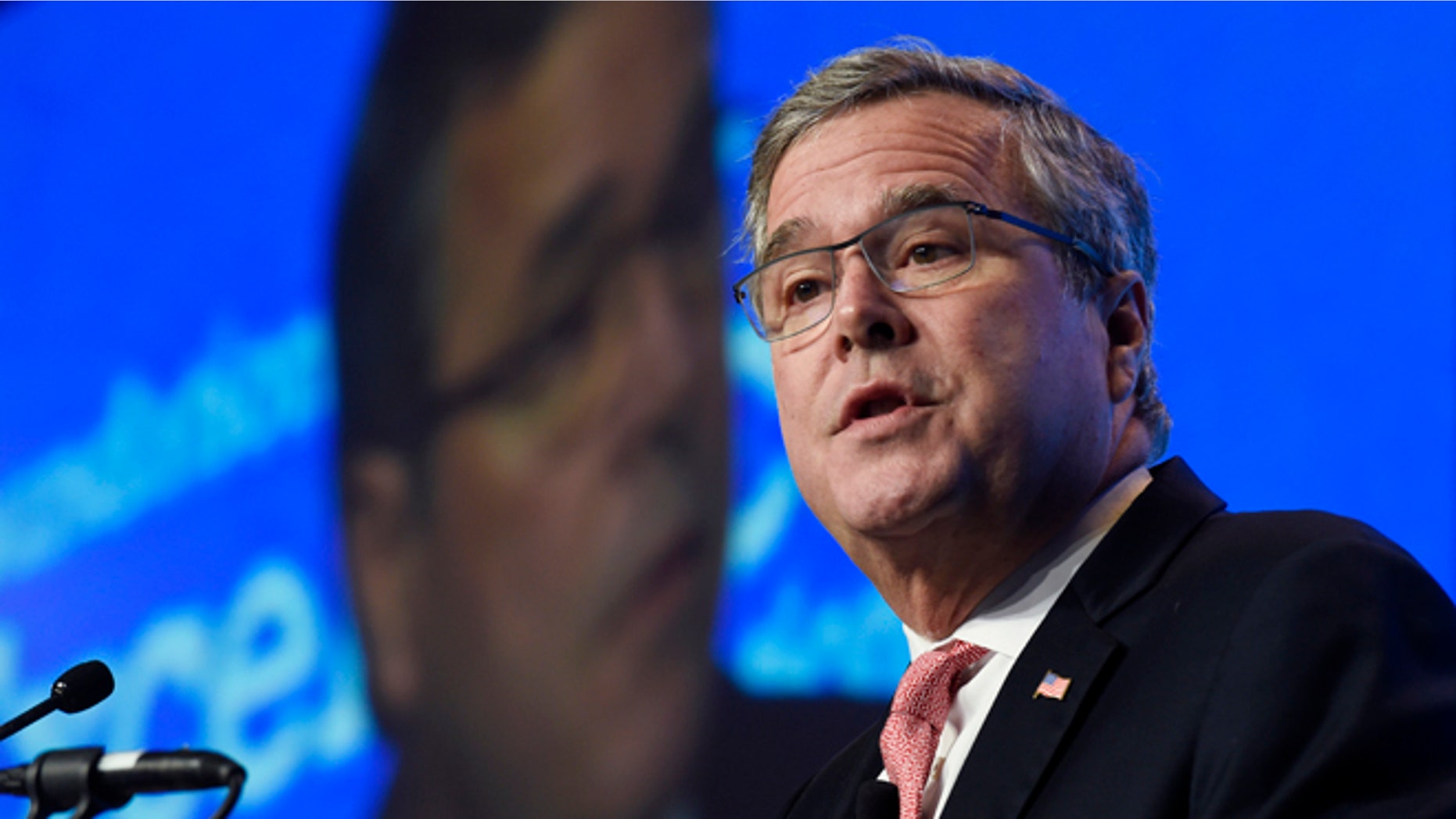 FILE - In this Nov. 20, 2014, file photo, former Florida Gov. Jeb Bush gives the keynote address at the National Summit on Education Reform in Washington. On Tuesday, Dec. 16, 2014, Bush took his most definitive step yet toward running for president, announcing plans to "actively explore" a campaign and form a new political operation allowing him to raise money for like-minded Republicans. (AP Photo/Susan Walsh, File)