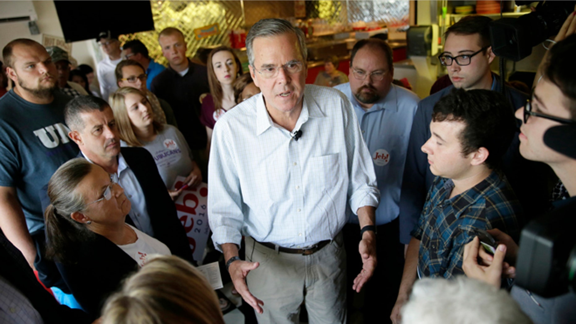 Republican presidential candidate, former Florida Gov. Jeb Bush speaks to supporters during a meet and greet with local residents at Gravy's Diner, Tuesday, Sept. 22, 2015, in Cedar Falls, Iowa. (AP Photo/Charlie Neibergall)