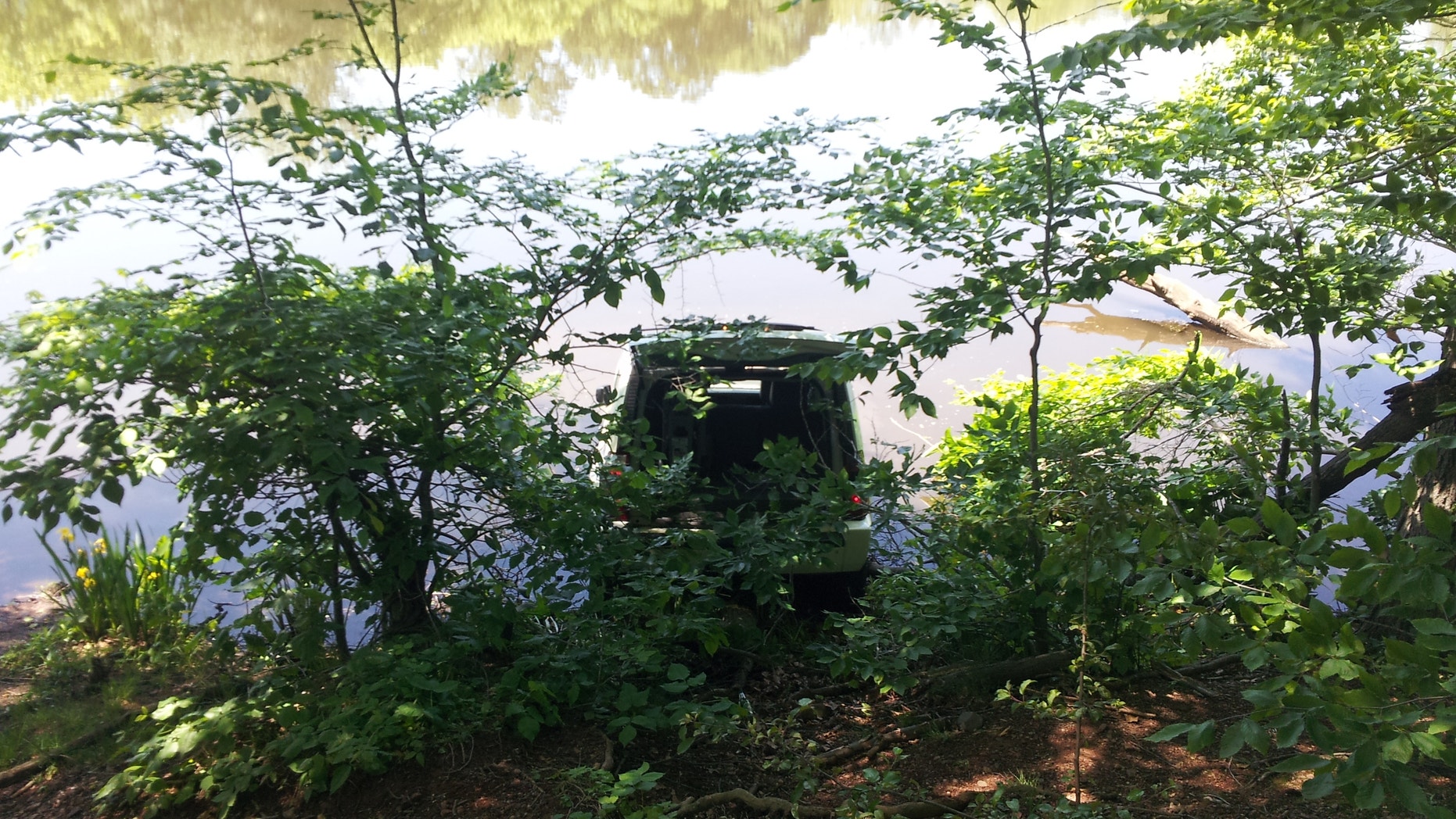 Frank Roders' Jeep took a bath, but he saved his son.