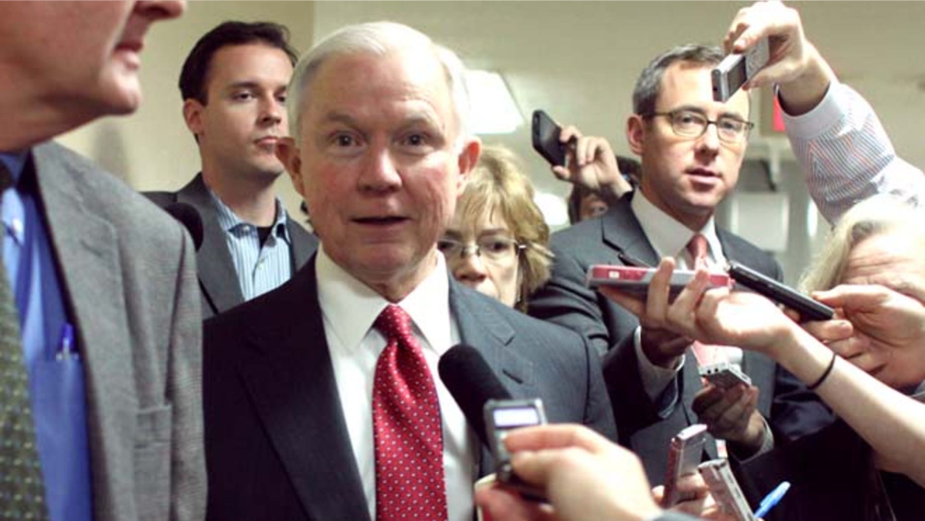 In this Friday, Dec. 12, 2014 photo, Sen. Jeff Sessions, R-Alabama talks to reporters on Capitol Hill in Washington.