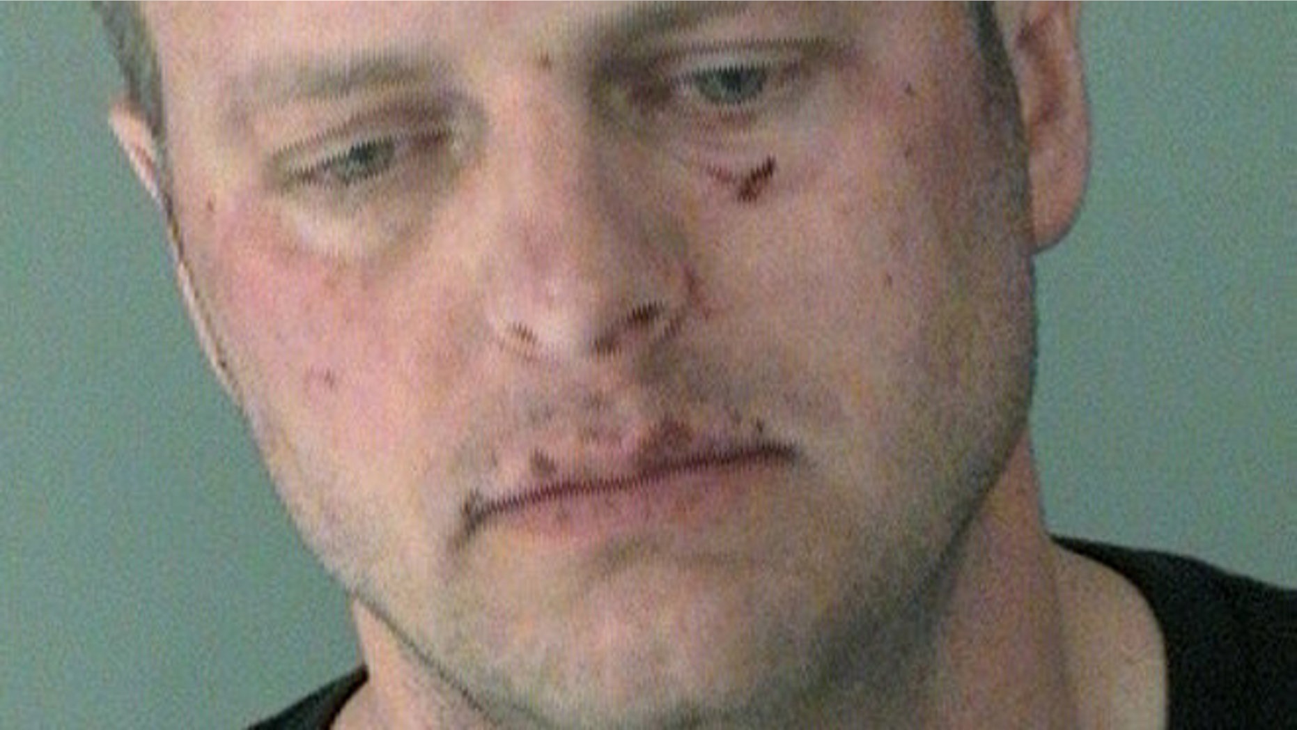 May 5, 2013: Jeffrey Krusinski, 41, the Air Force's Sexual Assault Prevention teamâs chief of staff, is seen in this mugshot after his arrest on a misdemeanor sexual battery charge.