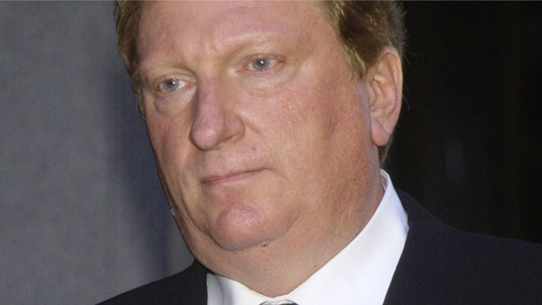 Nov. 2002: Jeffrey Jones appears at a news conference following his appearance in court on child pornography charges.