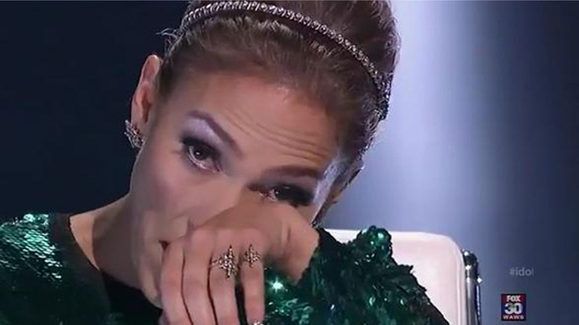 Feb. 23, 2012: Jennifer Lopez wipes tears as she tells American Idol contestant Jermaine Jones he did not make it to the top 24.