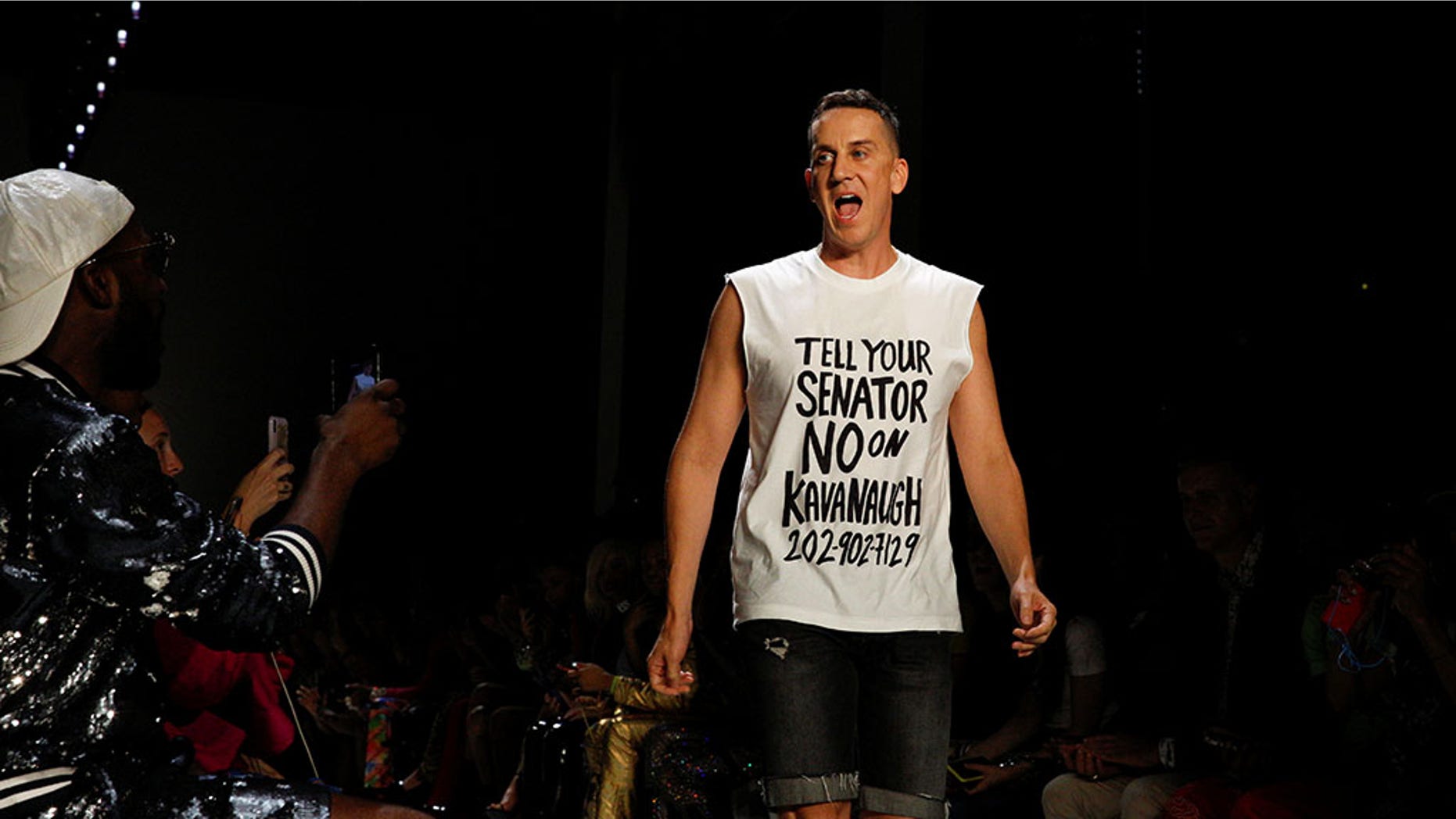 Fashion designer Jeremy Scott appears at the finale of the presentation of his spring 2019 collection during Fashion Week in New York, Thursday, Sept. 6, 2018.