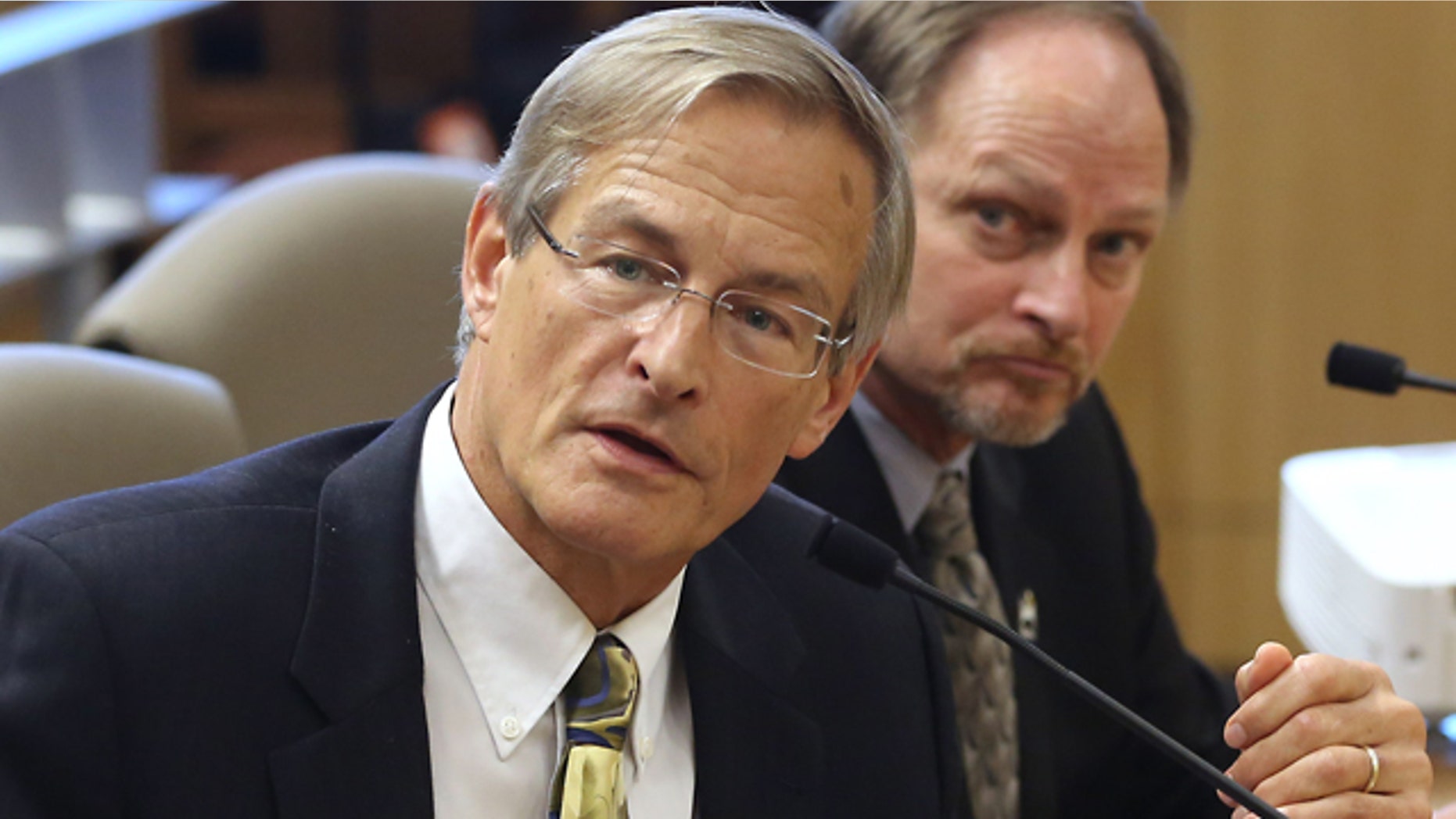 FILE - In this March 10, 2015, file photo, Steven Bohlen, left, then Gas Supervisor for the Conservation Departments Division of Oil, Gas and Geothermal Resources answers a question during a joint hearing of the Senate Natural Resources and Water and Environmental Quality Committees at the Capitol in Sacramento, Calif. (AP Photo/Rich Pedroncelli, File)