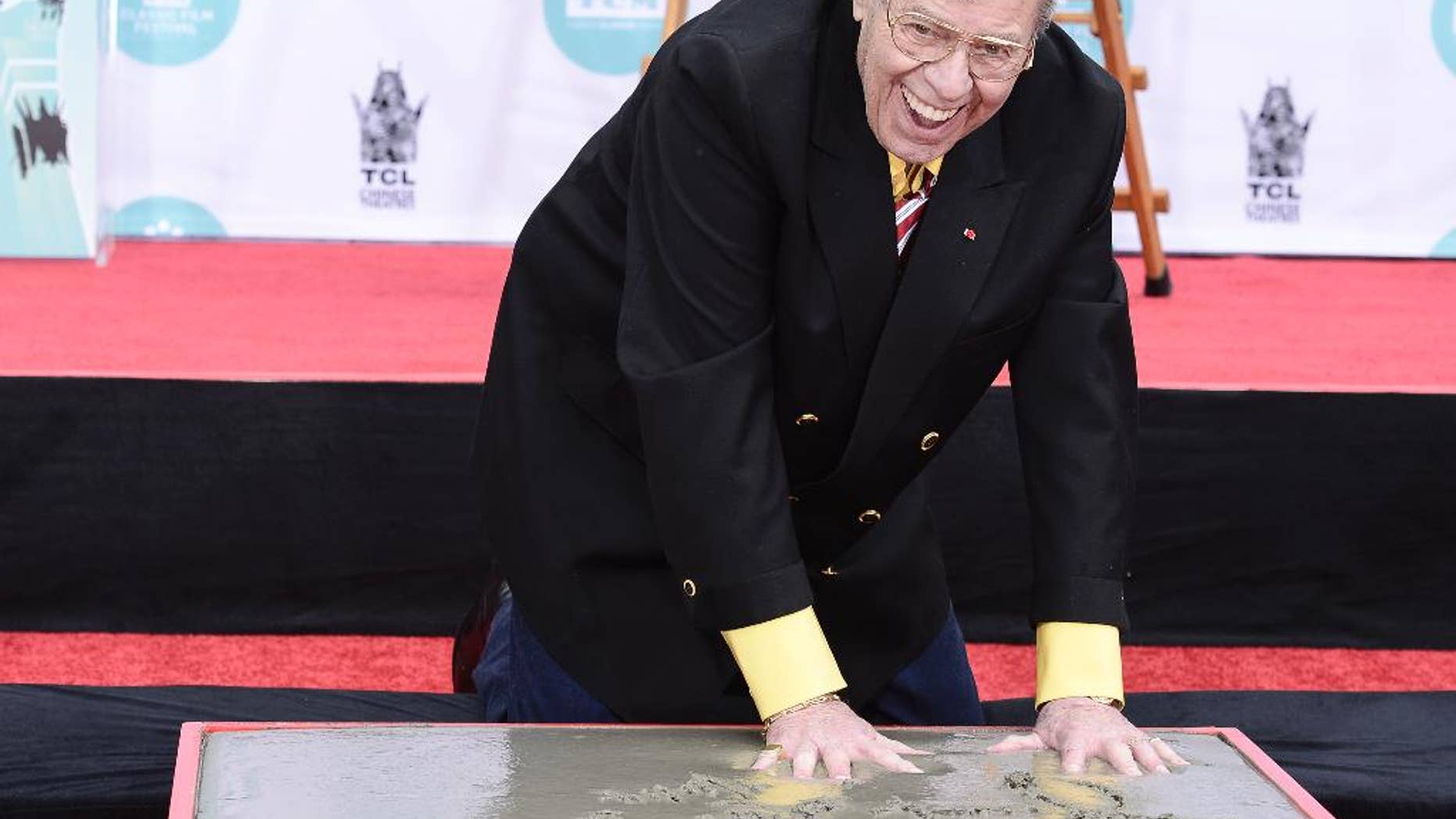 Actor and comedian Jerry Lewis is honored with a hand and footprint ceremony at TCL Chinese Theatre on Saturday, April 12, 2014 in Los Angeles. (Photo by Dan Steinberg/Invision/AP Images)