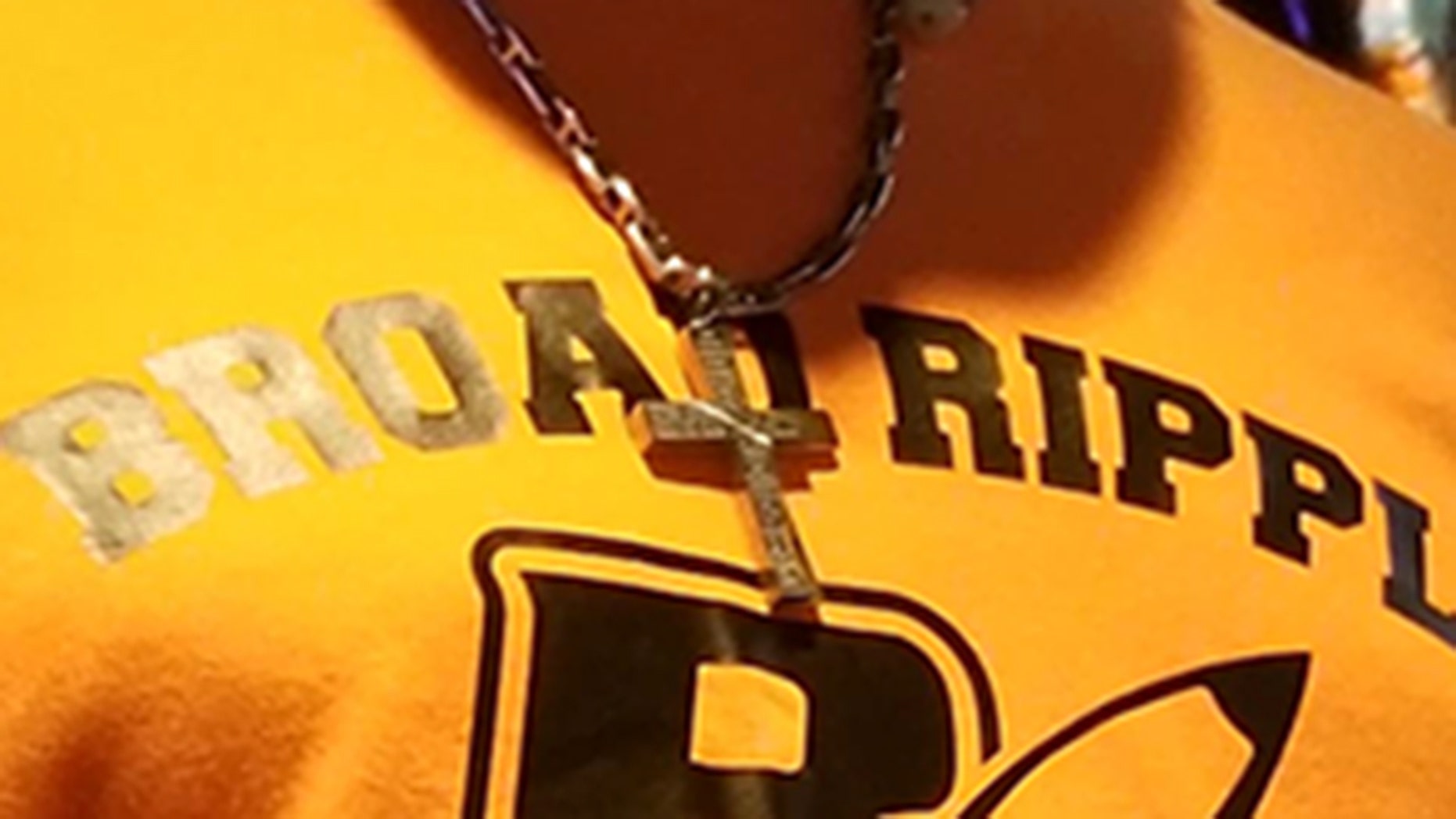 Jerry Bond claims he was asked to live a restaurant because of his large cross necklace