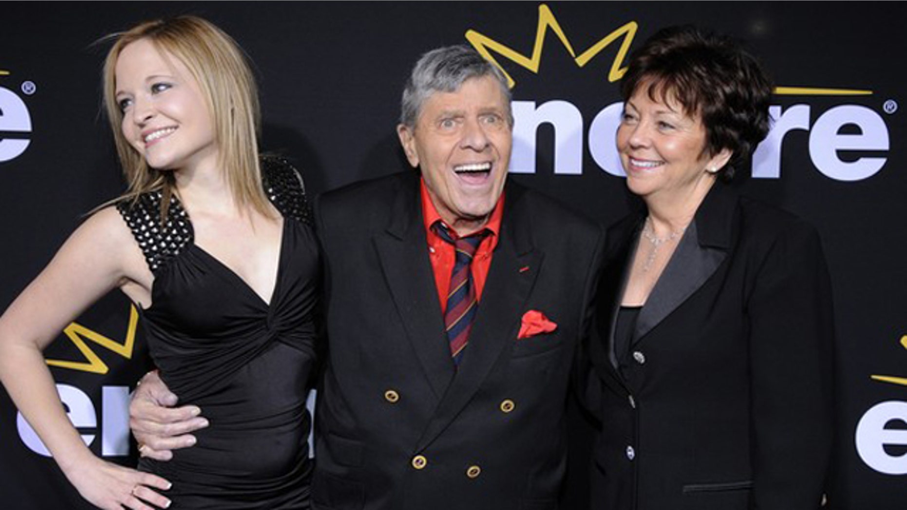 Dec. 7, 2011: Jerry Lewis (C) attends a special screening of the feature-length documentary "Method to the Madness of Jerry Lewis" held at Paramount Studios in Los Angeles, with his wife SanDee Pitnick (R) and daughter Danielle Lewis.