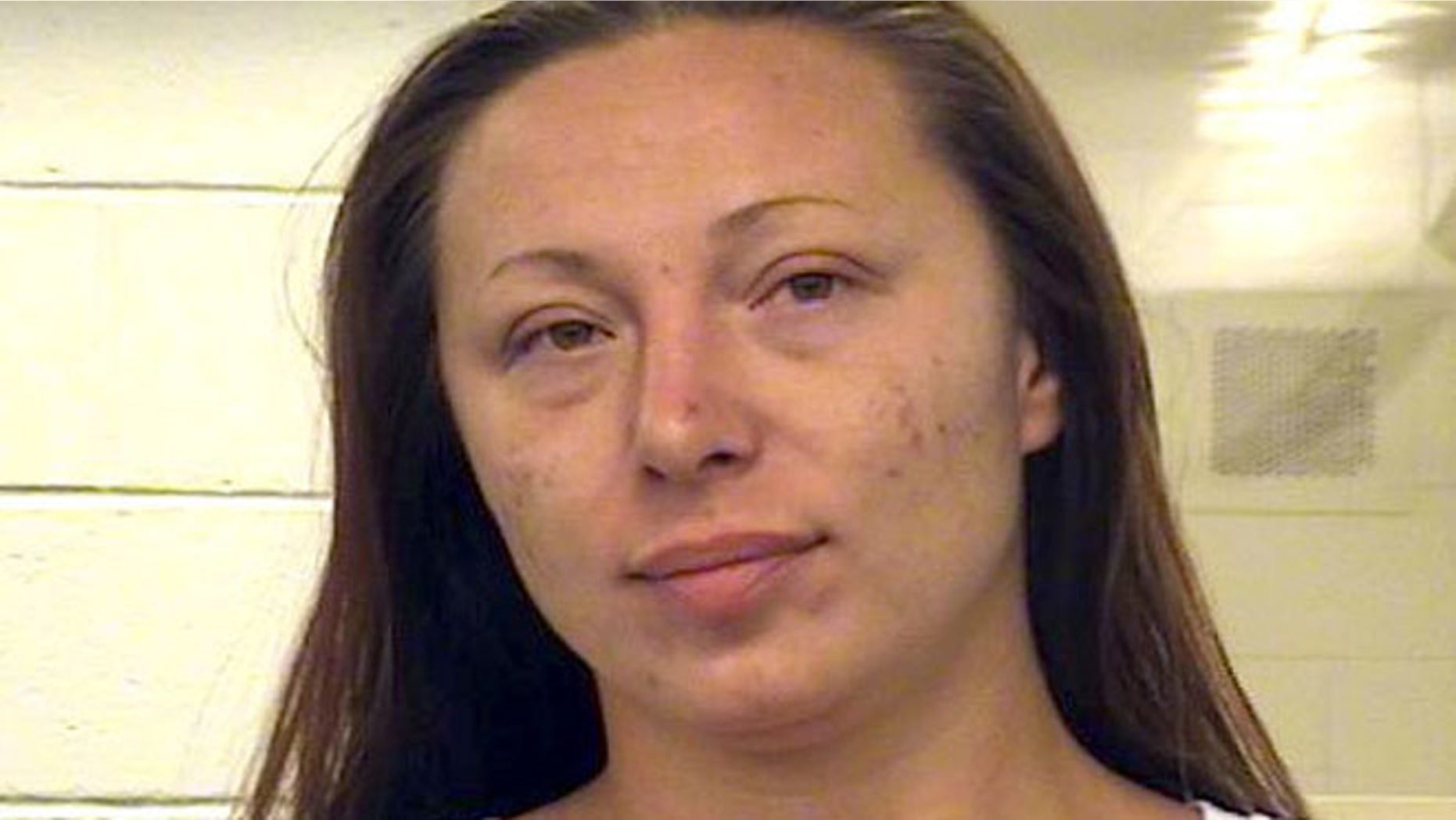 This undated photo provided by the Metropolitan Detention Center shows Jessica Kelley. On the day Victoria Martens was going to celebrate her 10th birthday, she was found dead in her family's apartment by Albuquerque police officers. Details of what New Mexico Gov. Susana Martinez and law enforcement officials described as an unspeakable crime emerged Thursday, Aug. 25, 2016, in a criminal complaint made public and filed against the girl's mother, her boyfriend and his cousin, Jessica Kelley. (Metropolitan Detention Center via AP)