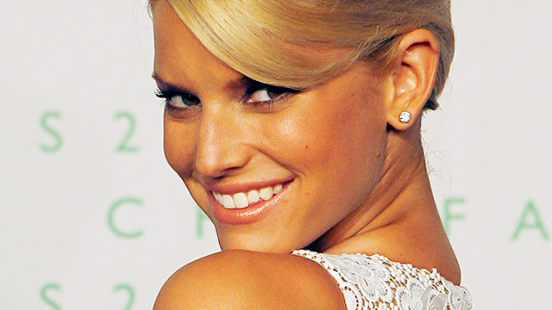June 5, 2006: Singer and actress Jessica Simpson poses for photographers on the red carpet of the 2006 CFDA Fashion Awards in New York City.