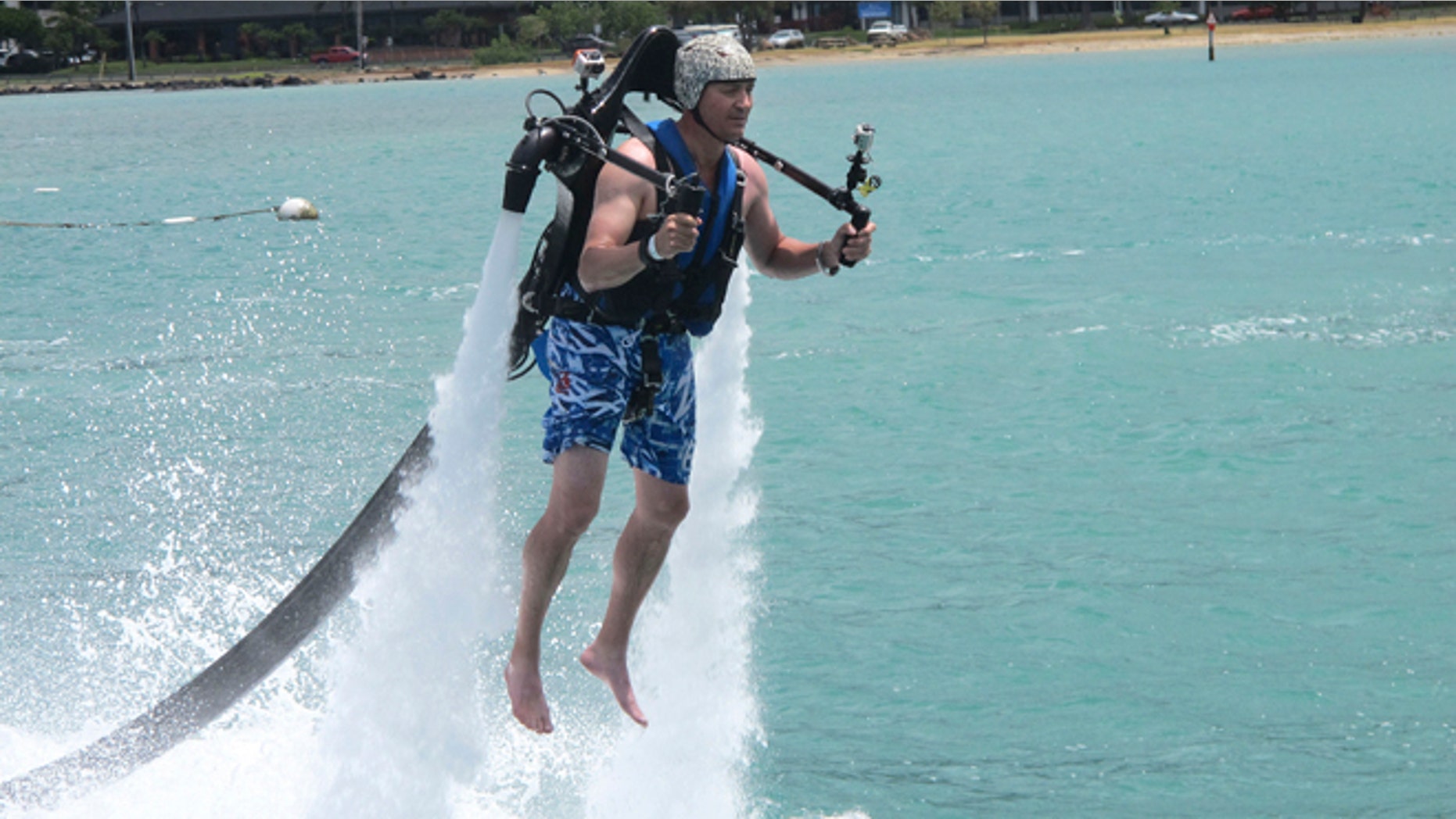 July 19, 2013: In this photo, customer Victor Verlage rides a Jetlev jetpack operated by the company H2O Water Sports Powered by Seabreeze in Honolulu. New devices that pump water fast enough to make people defy gravity are drawing thrill-seekers eager to try the next new watersport, but Hawaii fishermen, scientists and state officials are questioning their safety and how they may affect fish, coral and other fragile natural resources in the islands.