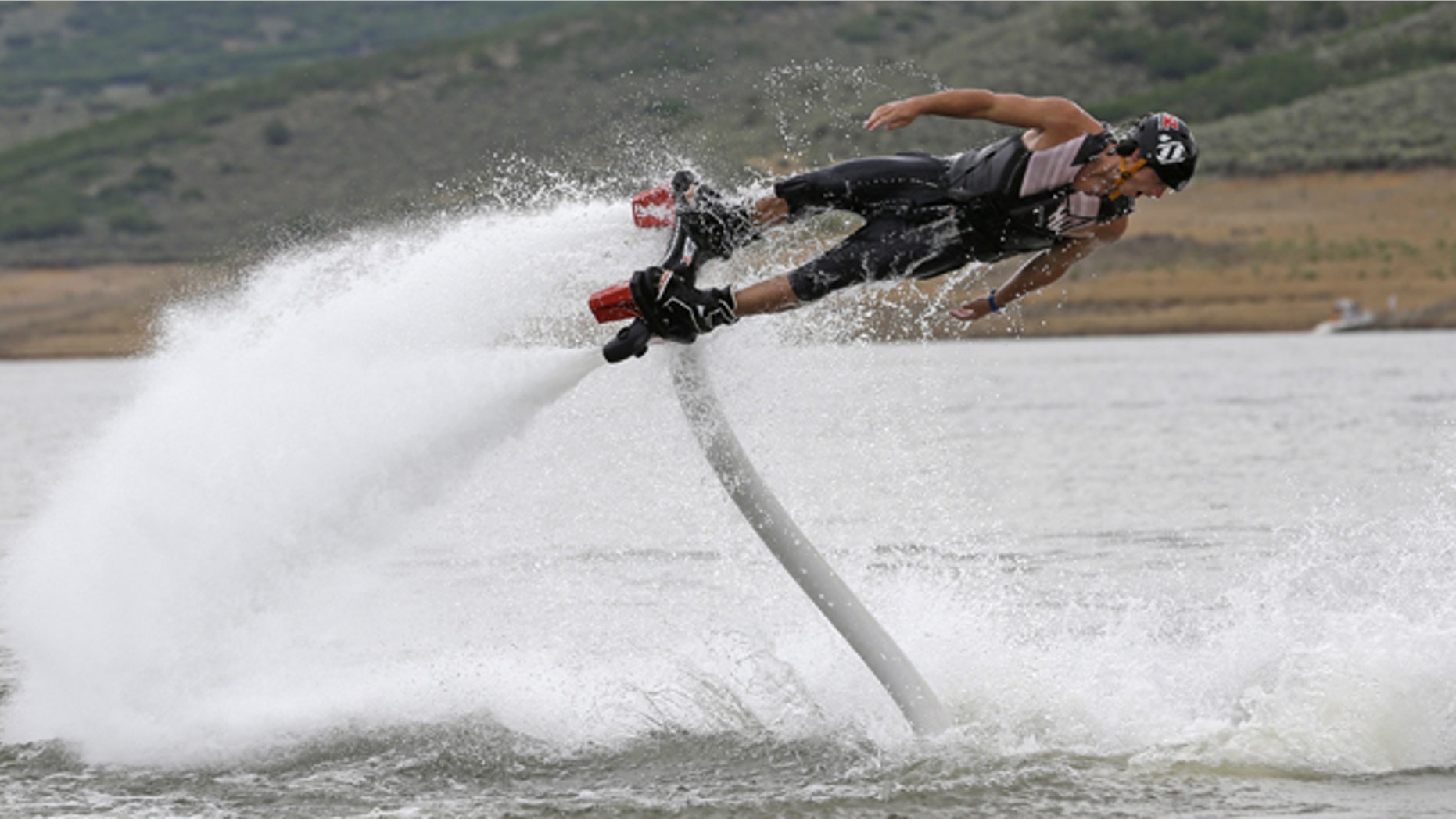 July 24, 2013: Rocky Mountain Flyboard instructor Chase Shaw demonstrates his flyboard, on the Jordanelle Reservoir, at Jordanelle State Park, Utah.