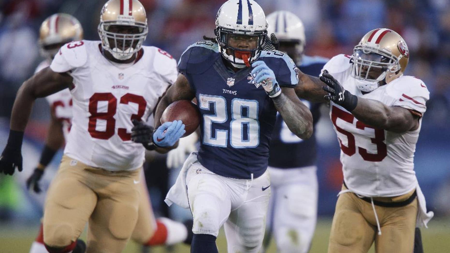 FILE - In this Oct. 20, 2013, file photo, Tennessee Titans running back Chris Johnson (28) runs ahead of San Francisco 49ers defenders Demarcus Dobbs (83) and NaVorro Bowman (53) on a touchdown reception in an NFL football game in Nashville, Tenn. The New York Jets signed the former Titans running back Wednesday, April 16, a little over a week after he was officially released by Tennessee on April 7. (AP Photo/Wade Payne, File)
