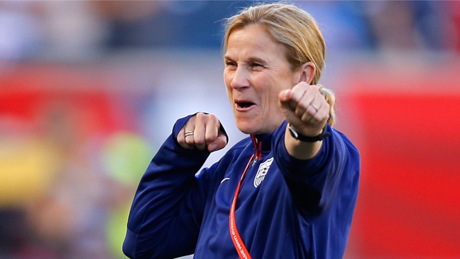 Head coach Jill Ellis of the United States watches her team warm up on June 12, 2015 in Winnipeg, Canada.