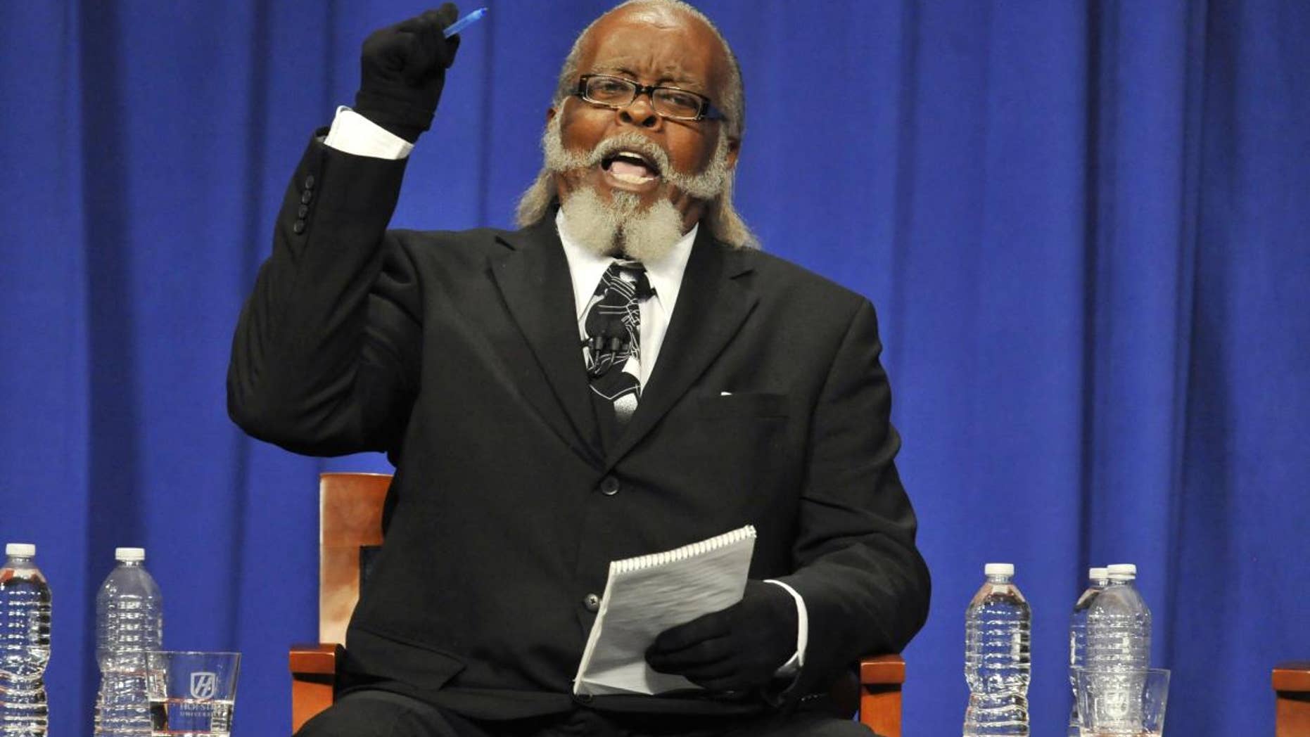 Jimmy McMillan, candidate for Rent is 2 Damn High party makes a point during the 2010 New York State Gubernatorial debate held at Hoftstra University in Hempstead, N.Y. (AP Photo/Kathy Kmonicek)
