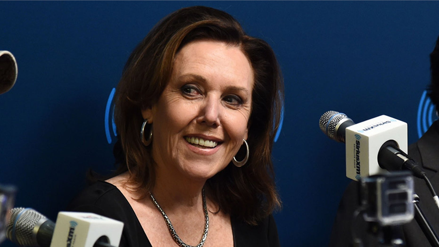MSNBC hosts have denounced their own network for firing popular liberal contributor Joan Walsh days before Christmas.