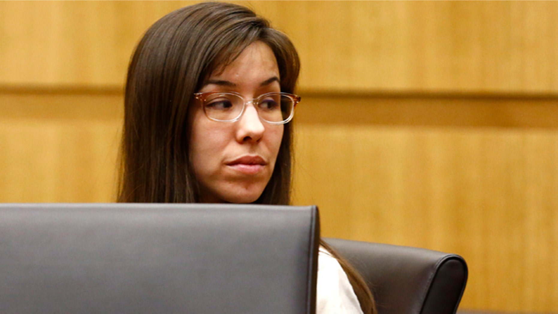 May 20, 2013: Jodi Arias looks at her family during the penalty phase of her murder trial at Maricopa County Superior Court in Phoenix, Ariz. (The Arizona Republic, Rob Schumacher, Pool)