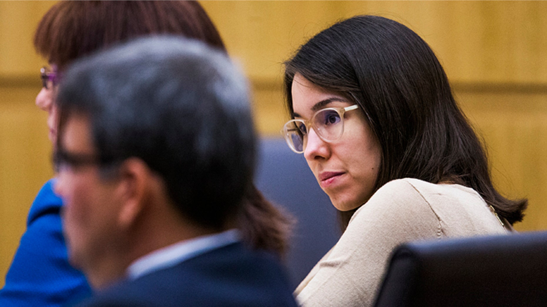 Jodi Arias sits in the Maricopa County Superior Court room of Judge Sherry Stephens in Phoenix, Tuesday, Oct. 21, 2014, as the opening statements in her penalty phase retrial begins. The 34-year-old Arias was convicted of murder last year, but the first jury was deadlocked on whether to give her the death penalty or life in prison. (AP Photo/The Arizona Republic, Tom Tingle, Pool)