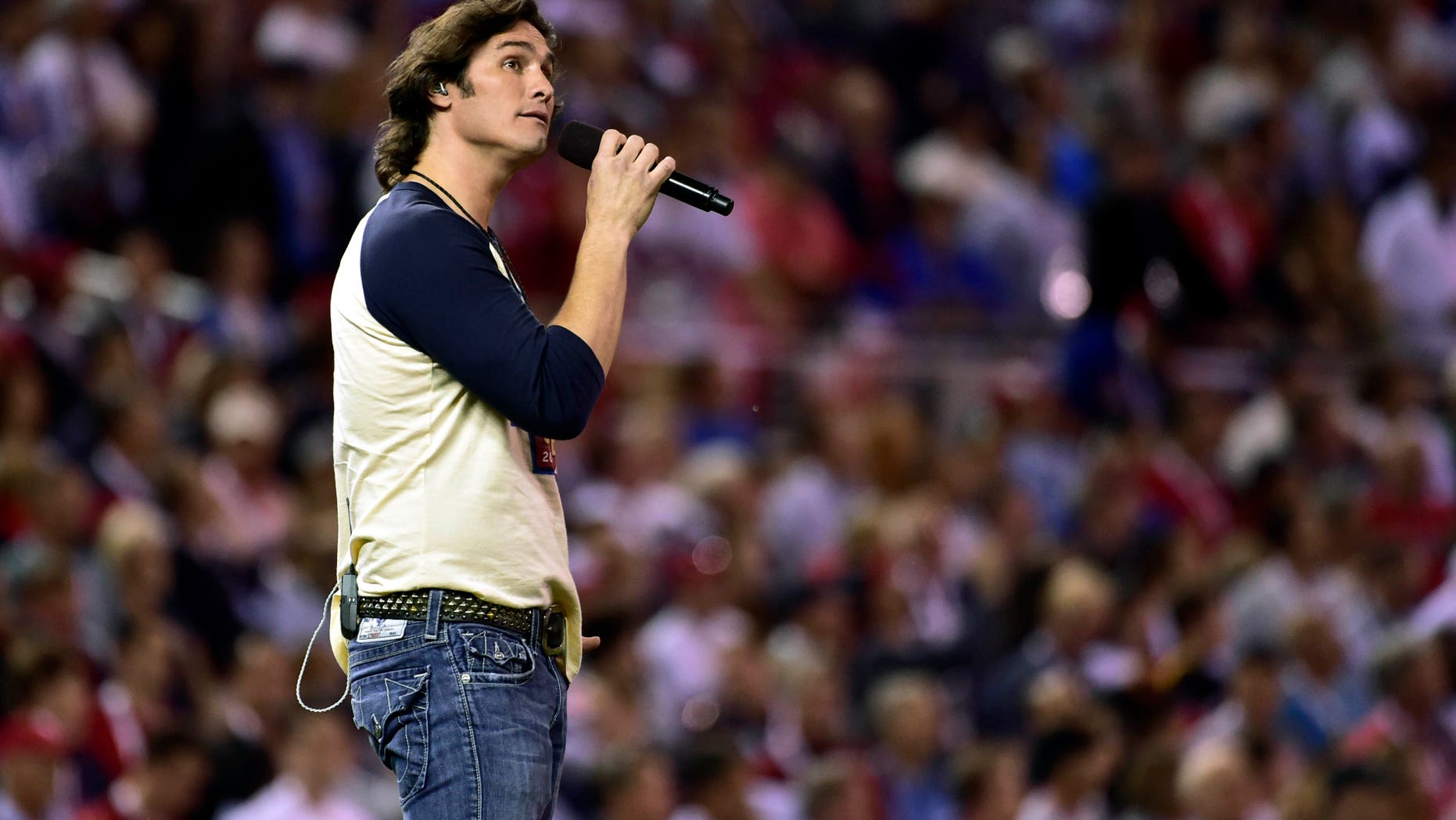 Jul 15, 2014; Minneapolis, MN, USA; Country recording artist Joe Nichols sings during the seventh inning stretch during the 2014 MLB All Star Game at Target Field. Mandatory Credit: Scott Rovak-USA TODAY Sports - RTR3YTIK