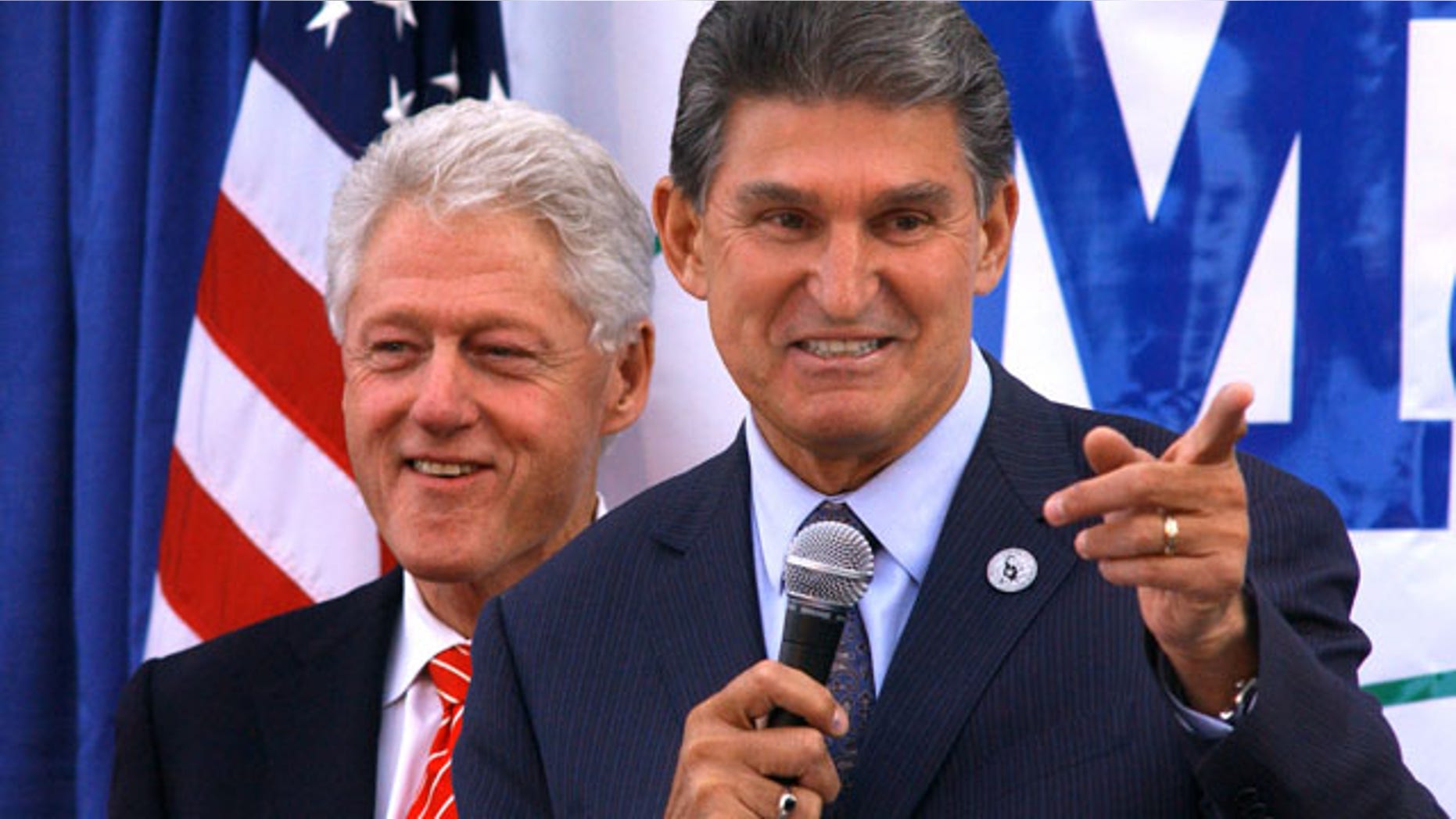 Nov. 1: Former president Bill Clinton smiles as W.Va. Governor Joe Manchin campaigns at Tamarack in Beckley, W.Va.