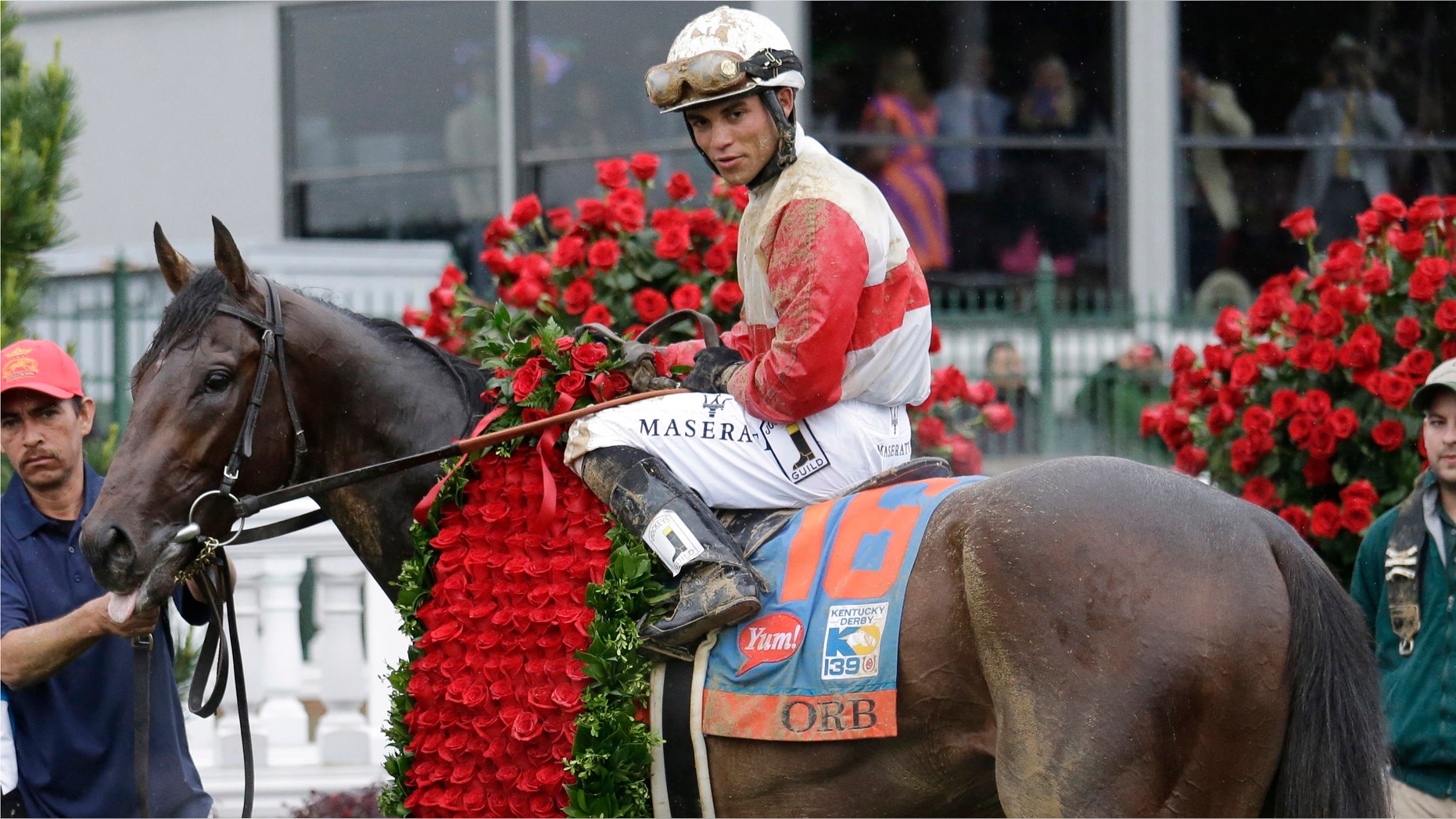Joel Rosario sits on Orb in the winners circle after winning the 139th Kentucky Derby at Churchill Downs Saturday, May 4, 2013, in Louisville, Ky. (AP Photo/J. David Ake)