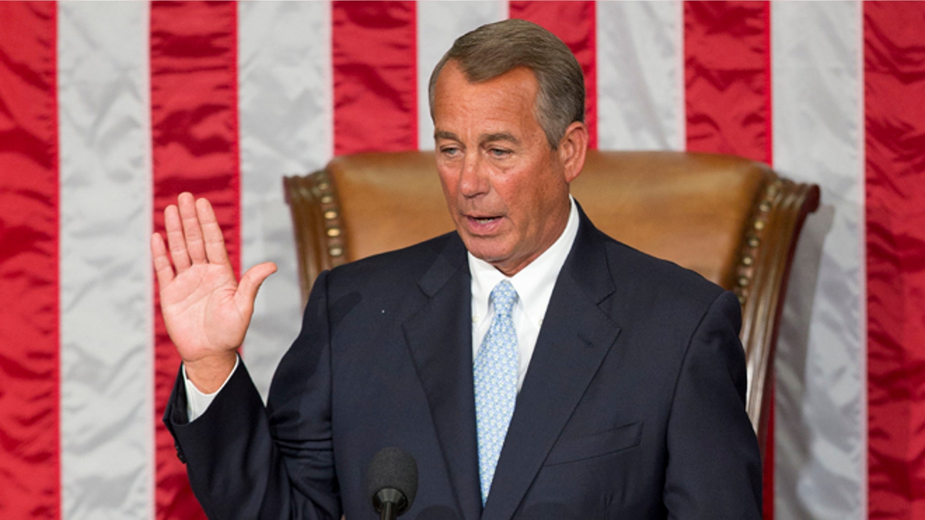 In this Tuesday, Jan. 6, 2015 photo House Speaker John Boehner of Ohio takes the oath of office after being re-elected to a third term during the opening session of the 114th Congress.