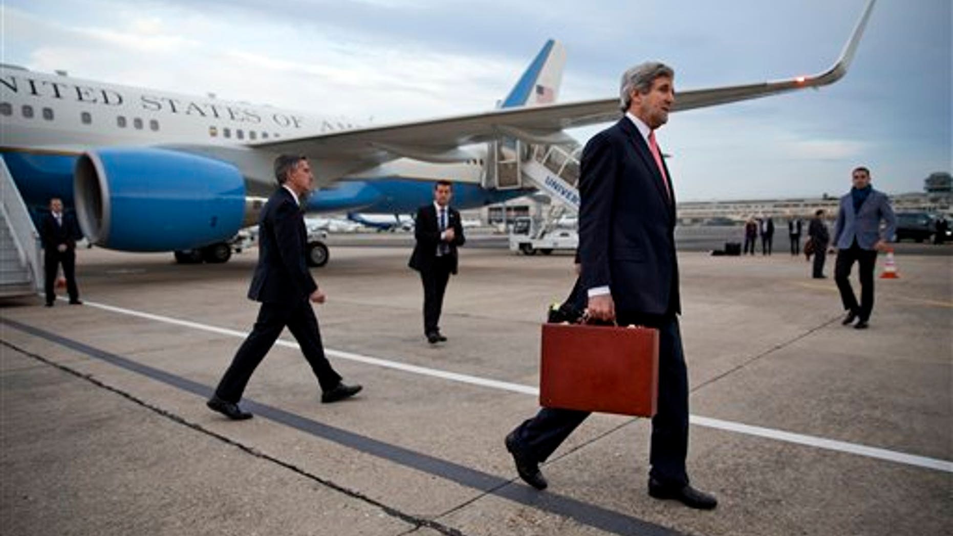 U.S. Secretary of State John Kerry arrives in Paris, on Saturday March 29, 2014. After leaving Saudi Arabia the secretary canceled a return to Washington in order to travel to Paris for a meeting with Russian Foreign Minister Sergey Lavrov about the situation in Ukraine. The meeting was arranged during a refueling stop in Ireland en route to Paris. (AP Photo/Jacquelyn Martin, Pool)