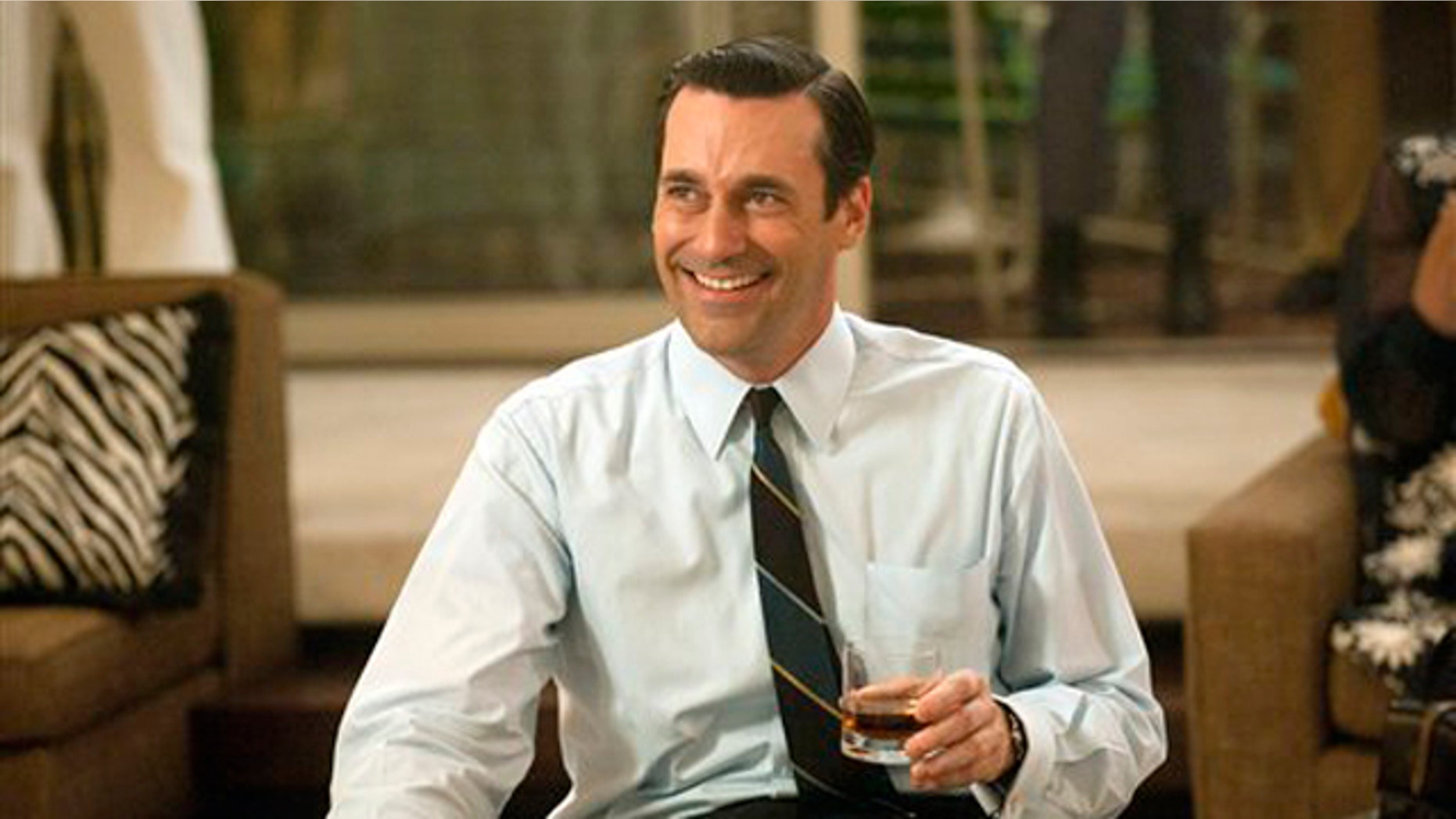 In this image released by AMC, Jon Hamm portrays advertising executive Don Draper in a scene from the fifth season premiere of 'Mad Men.'
