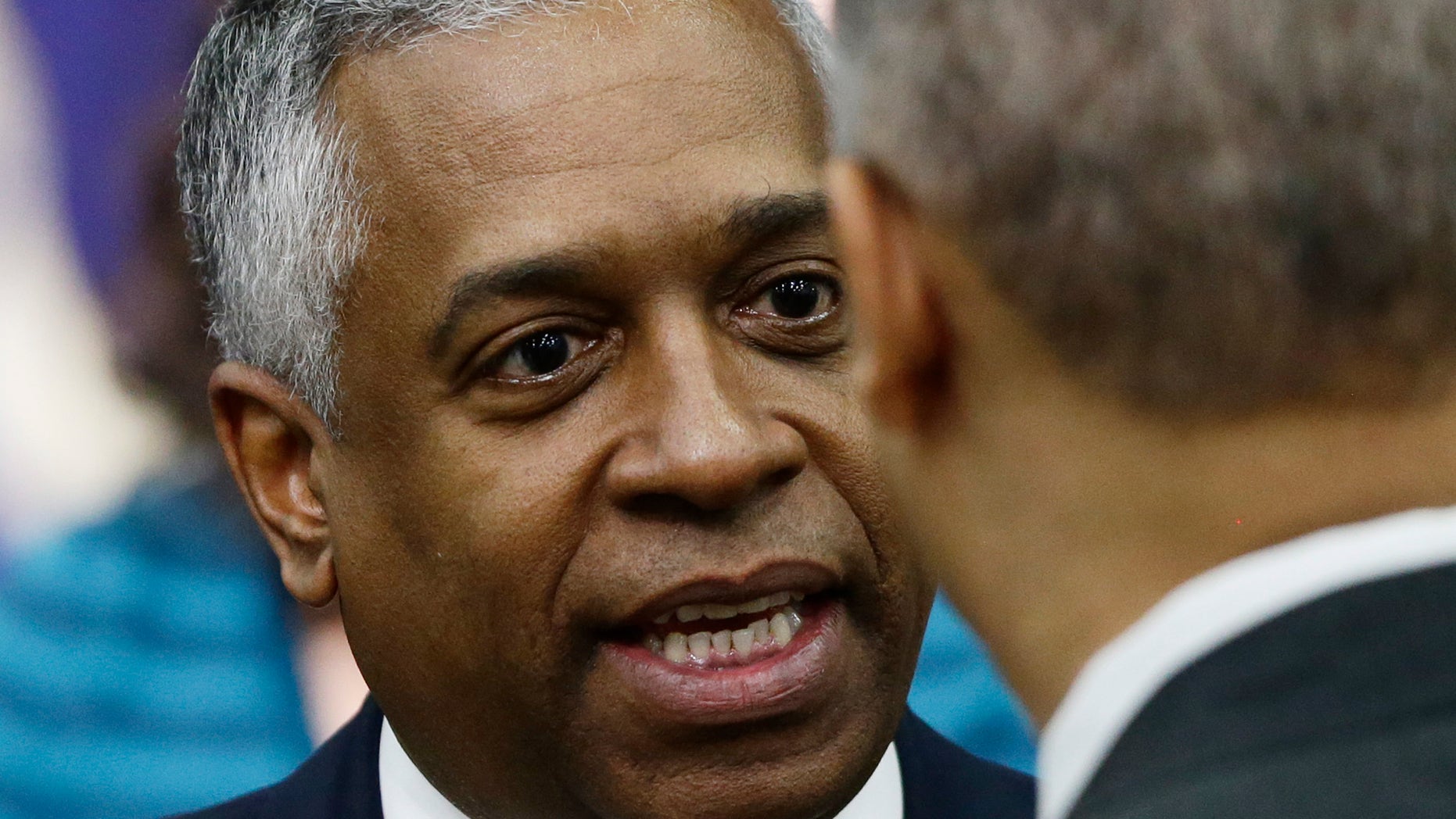 FILE: Jan. 16, 2013: Acting Bureau of Alcohol, Tobacco, Firearms and Explosives Director B. Todd Jones talks to Attorney General Eric Holder in the South Court Auditorium at the White House in Washington, D.C.