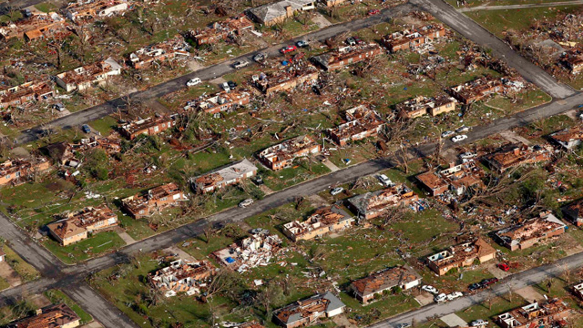 May 24: Aerial file photo shows a neighborhood destroyed by a powerful tornado in Joplin, Mo.