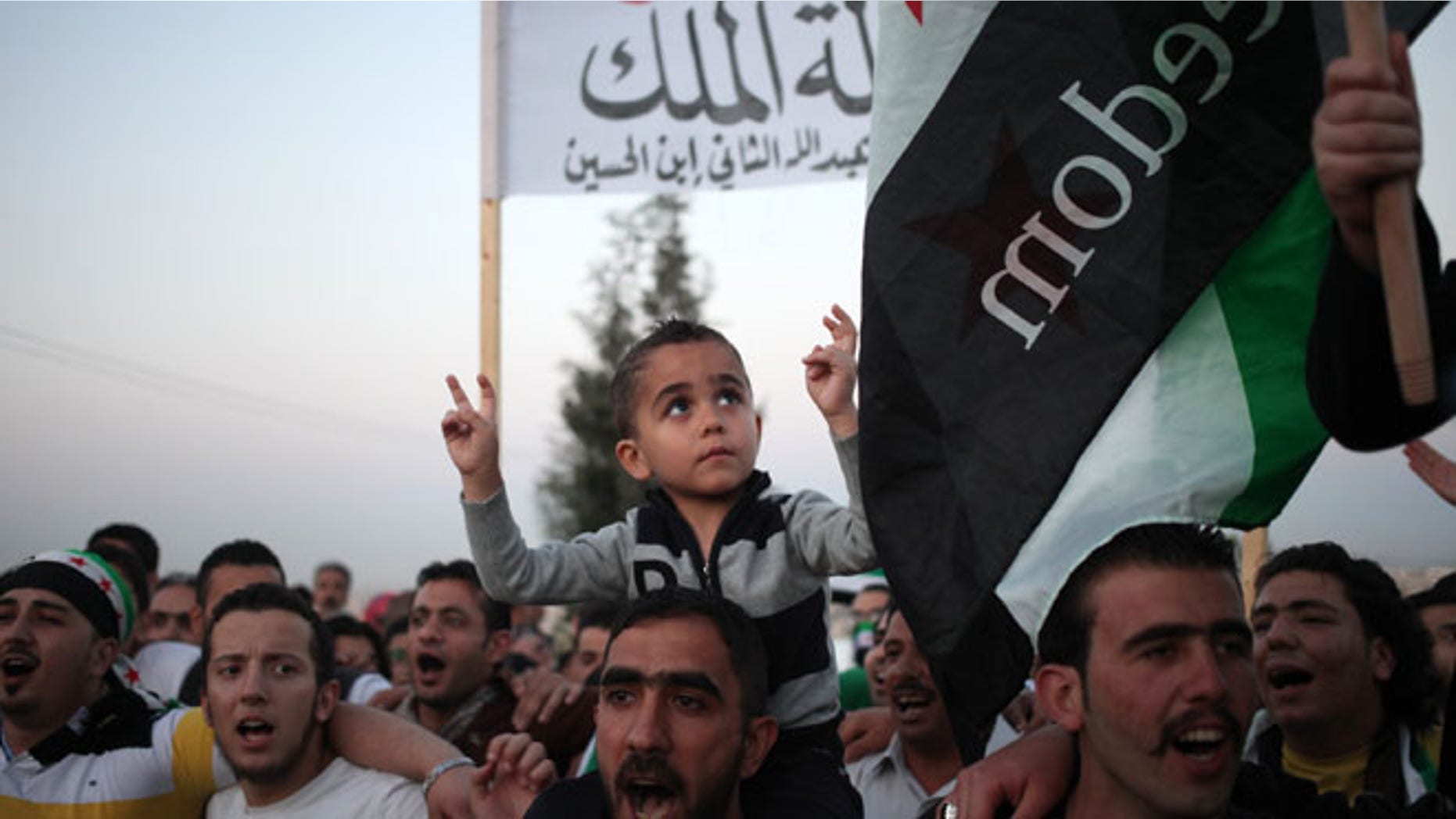 May 26, 2014.: Syrian expatriates chant anti-Assad slogans as they celebrate the Jordanian government's decision to expel the Syrian Ambassador, Bahjat Suleiman, in Jordan.