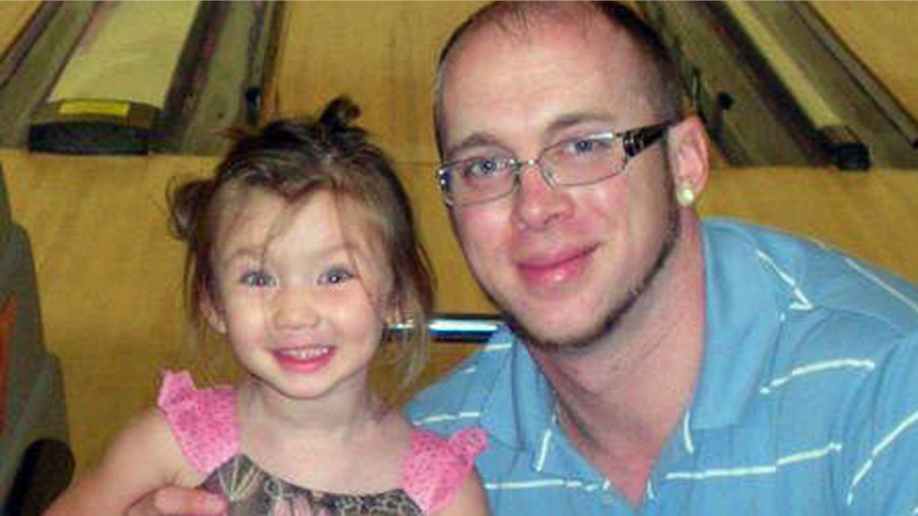 In this undated photo made available by Jordan Arwood, shows him with his daughter Chloe Jade Arwood.