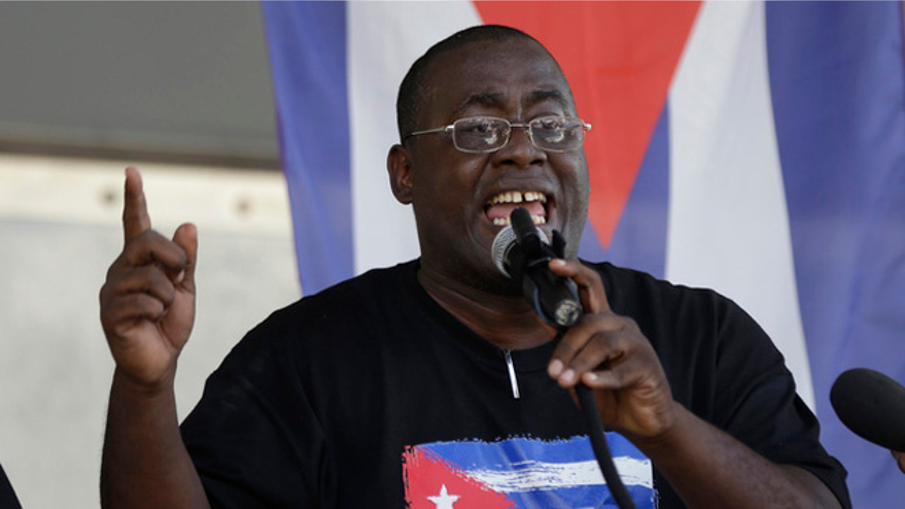 Cuban dissident Jorge Luis Garcia Perez, known by the nickname "Antunez", speaks during a protest against President Barack Obama's plan to normalize relations with Cuba, Saturday, Dec, 20, 2014, in the Little Havana neighborhood of Miami. (AP Photo/Lynne Sladky)